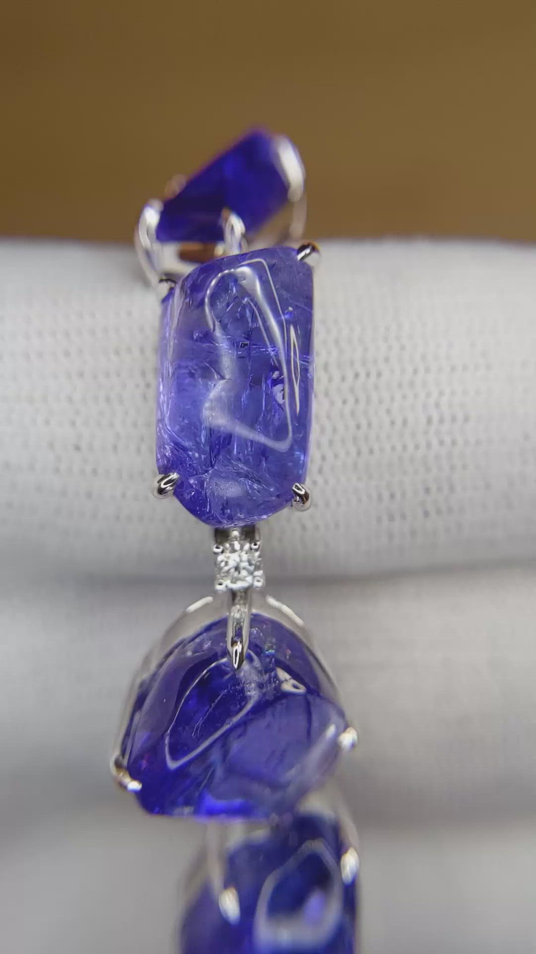 108.83&nbsp;Ct.Tw.Total Carat Weight Violetish Blue Tanzanite and Natural Diamond Accent Stones Bracelet, 18K White Gold Size Video
