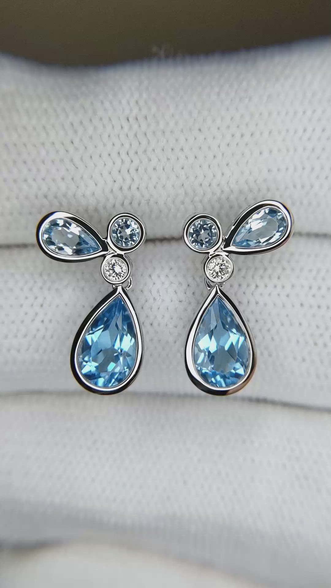 2.18 Ct.Tw.Total Carat Weight Blue Topaz and Natural Diamond Studs Earrings, Silver Size Video