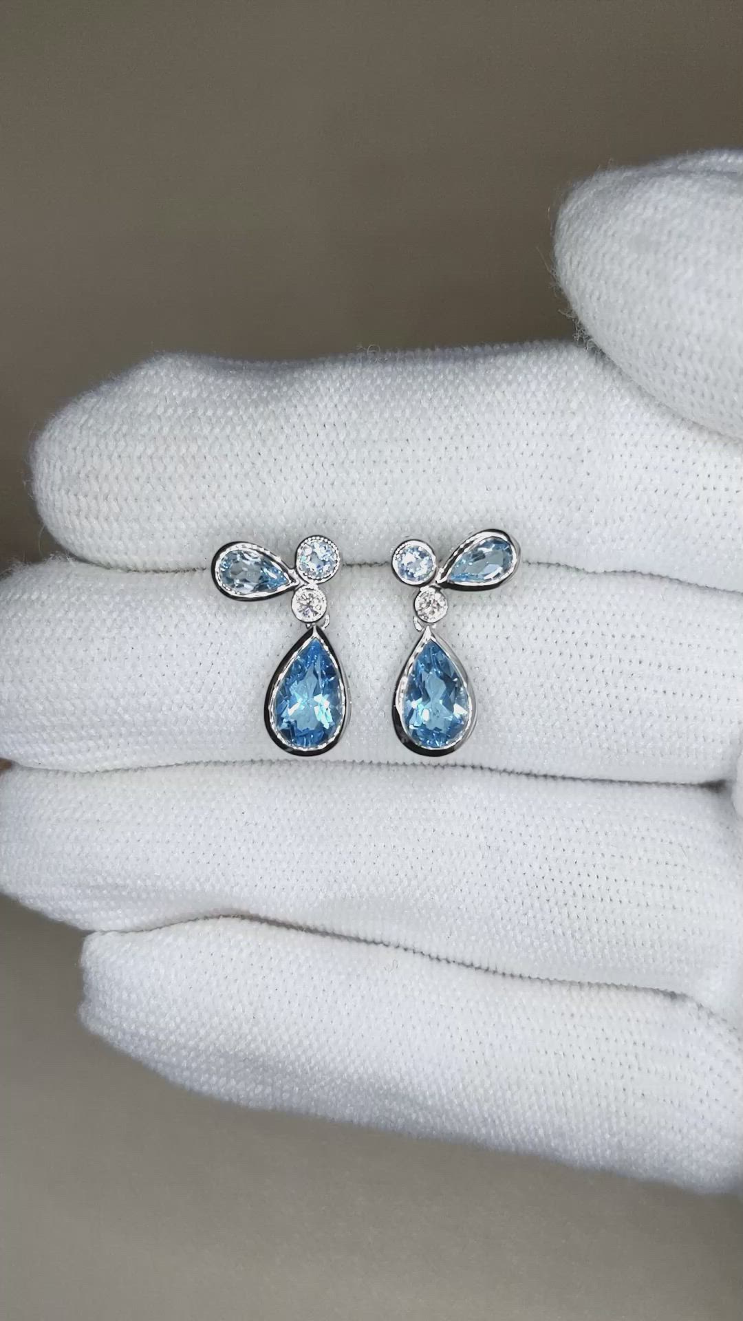 2.18 Ct.Tw.Total Carat Weight Blue Topaz and Natural Diamond Studs Earrings, Silver Size Video