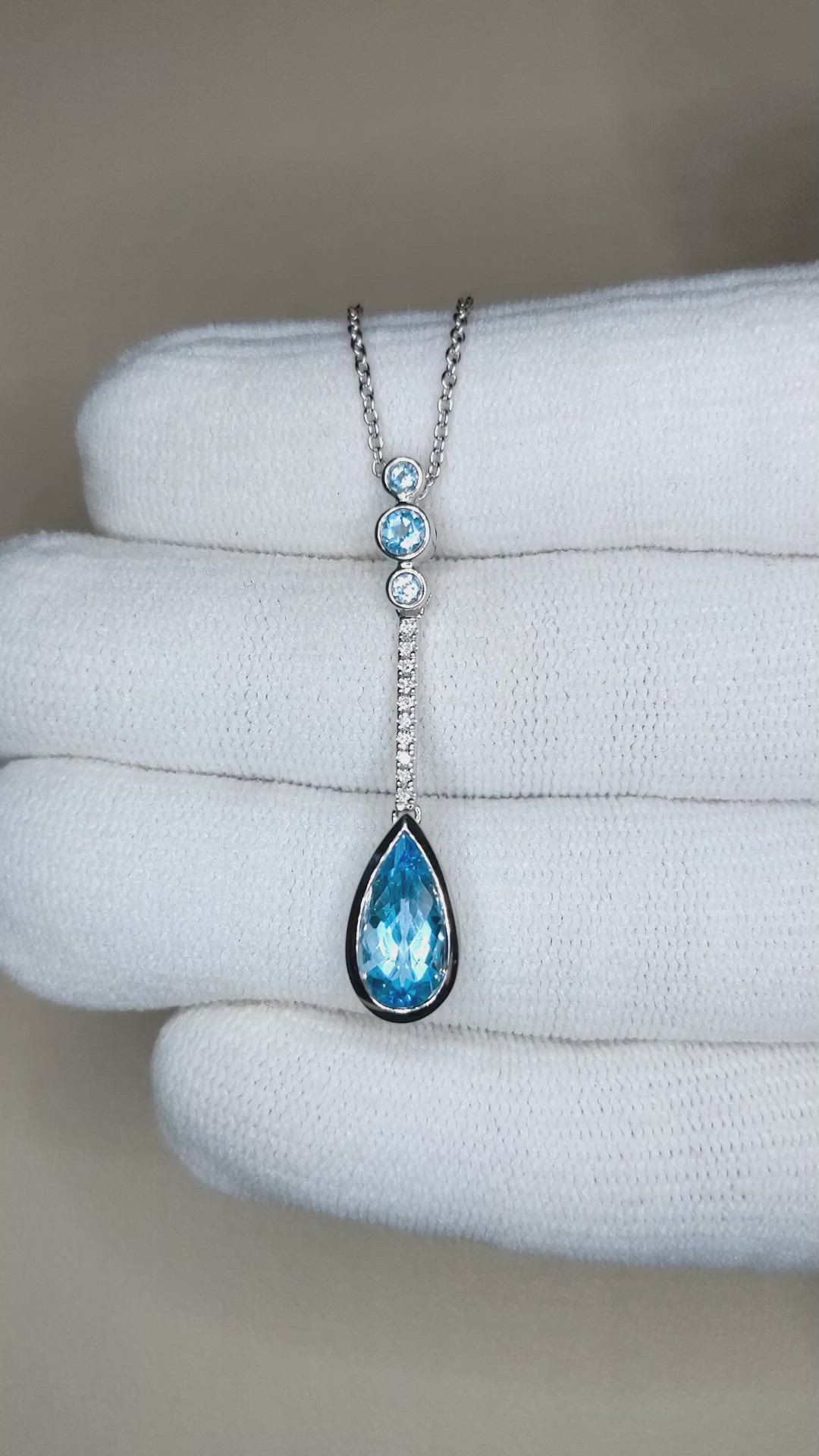 1.82 Ct. Blue Topaz and Natural Diamond Bezel Pendant, Silver Size Video
