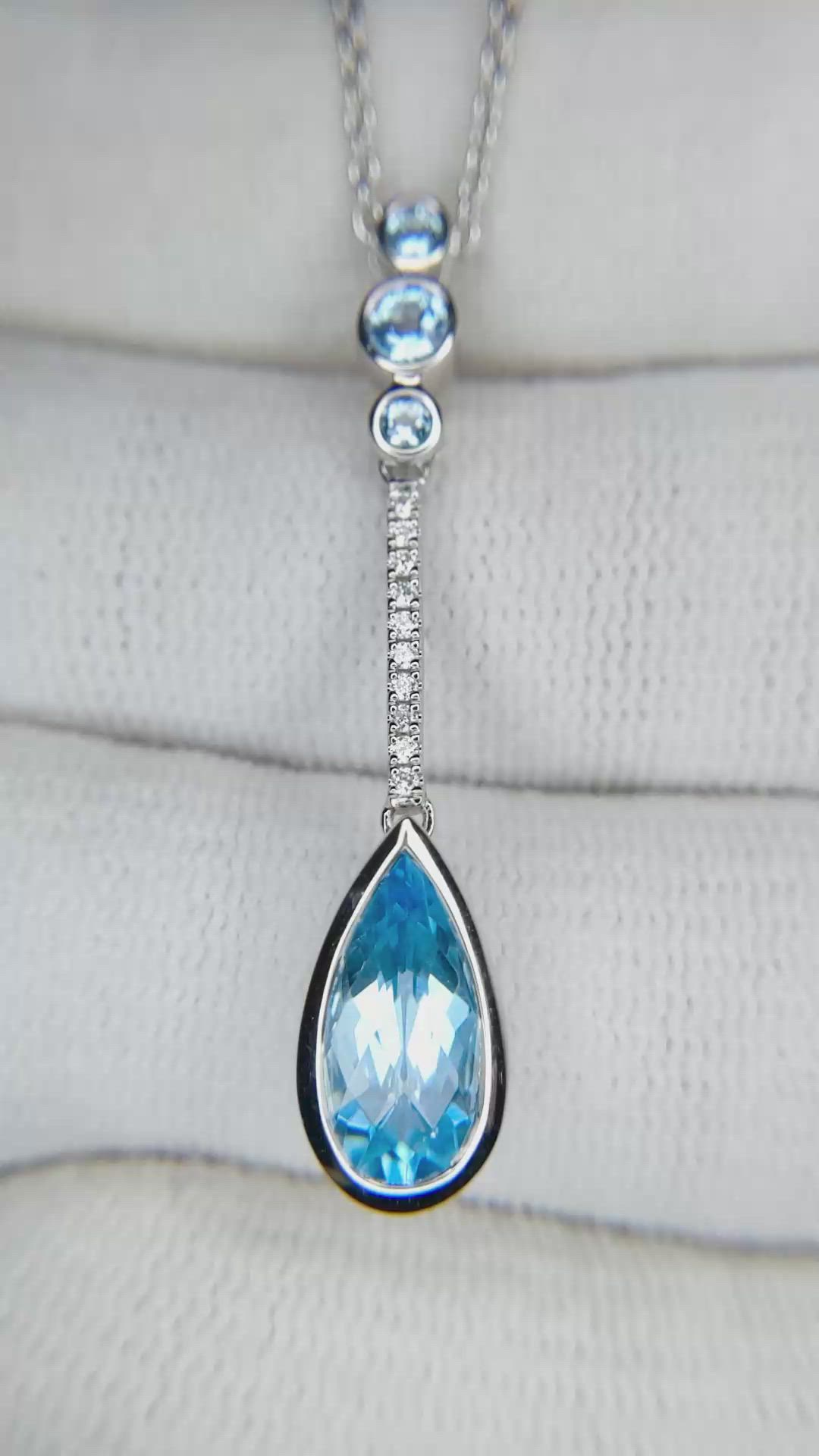 1.82 Ct. Blue Topaz and Natural Diamond Bezel Pendant, Silver Size Video