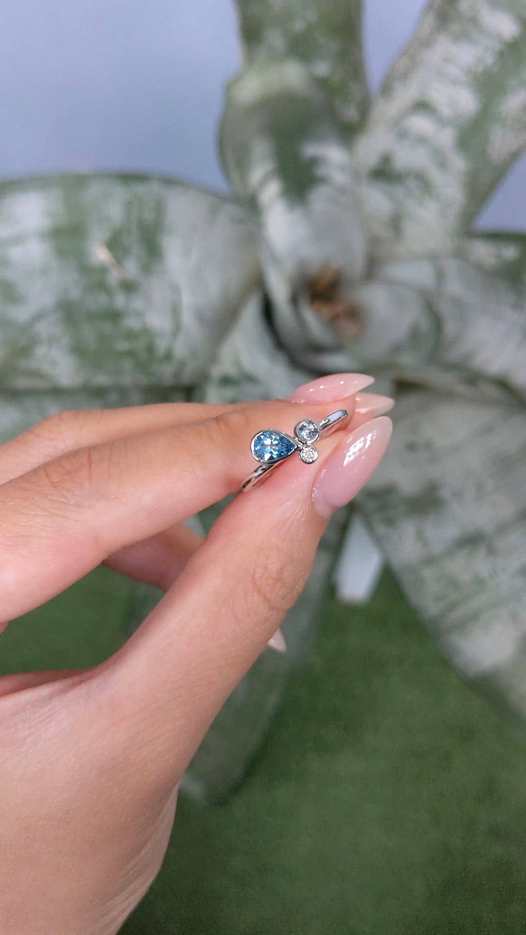 0.48 Ct. Blue Topaz and Natural Diamond Bezel Ring, Silver Size Video