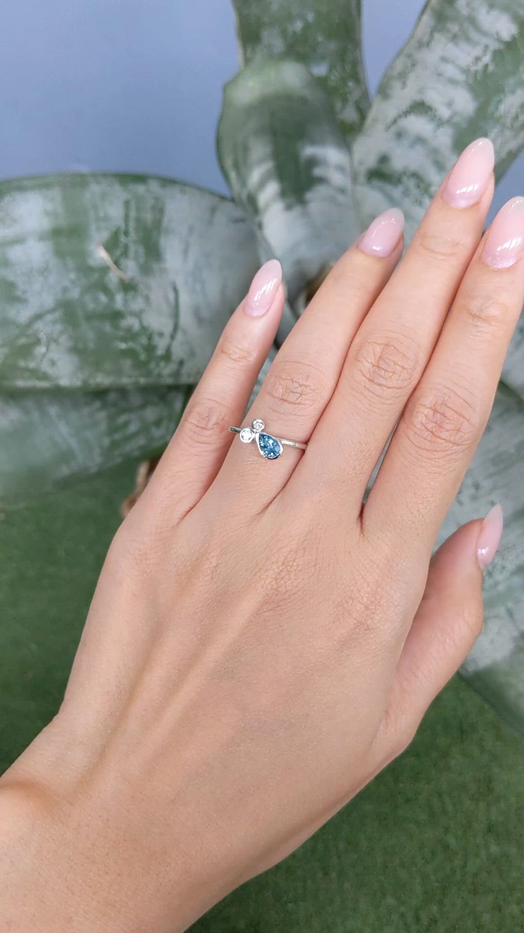 0.48 Ct. Blue Topaz and Natural Diamond Bezel Ring, Silver Size Video