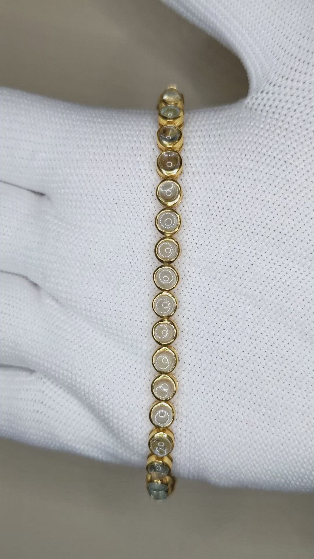 6.47&nbsp;Ct.Tw.Total Carat Weight Blue Topaz Bezel Bracelet, 22K Gold Plated Silver Size Video