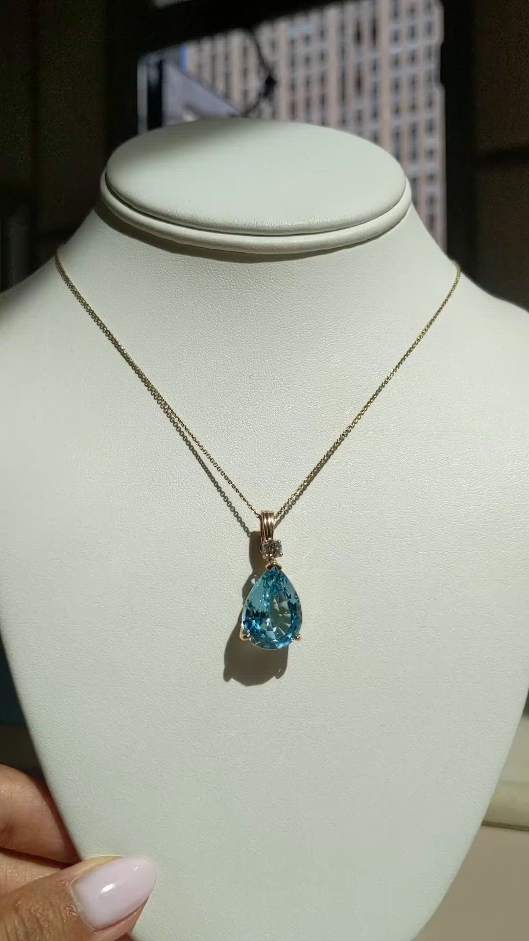 13.33 Ct. Blue Topaz and Natural Diamond Accent Stones Pendant, 14K Yellow Gold Size Video