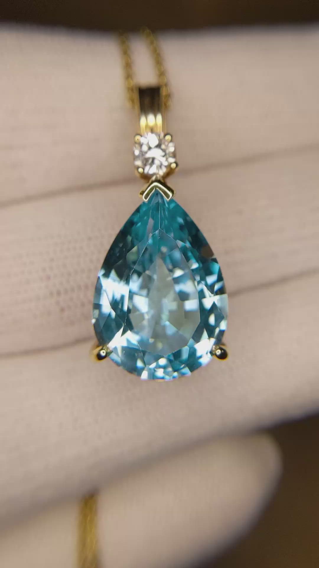 13.33 Ct. Blue Topaz and Natural Diamond Accent Stones Pendant, 14K Yellow Gold Size Video