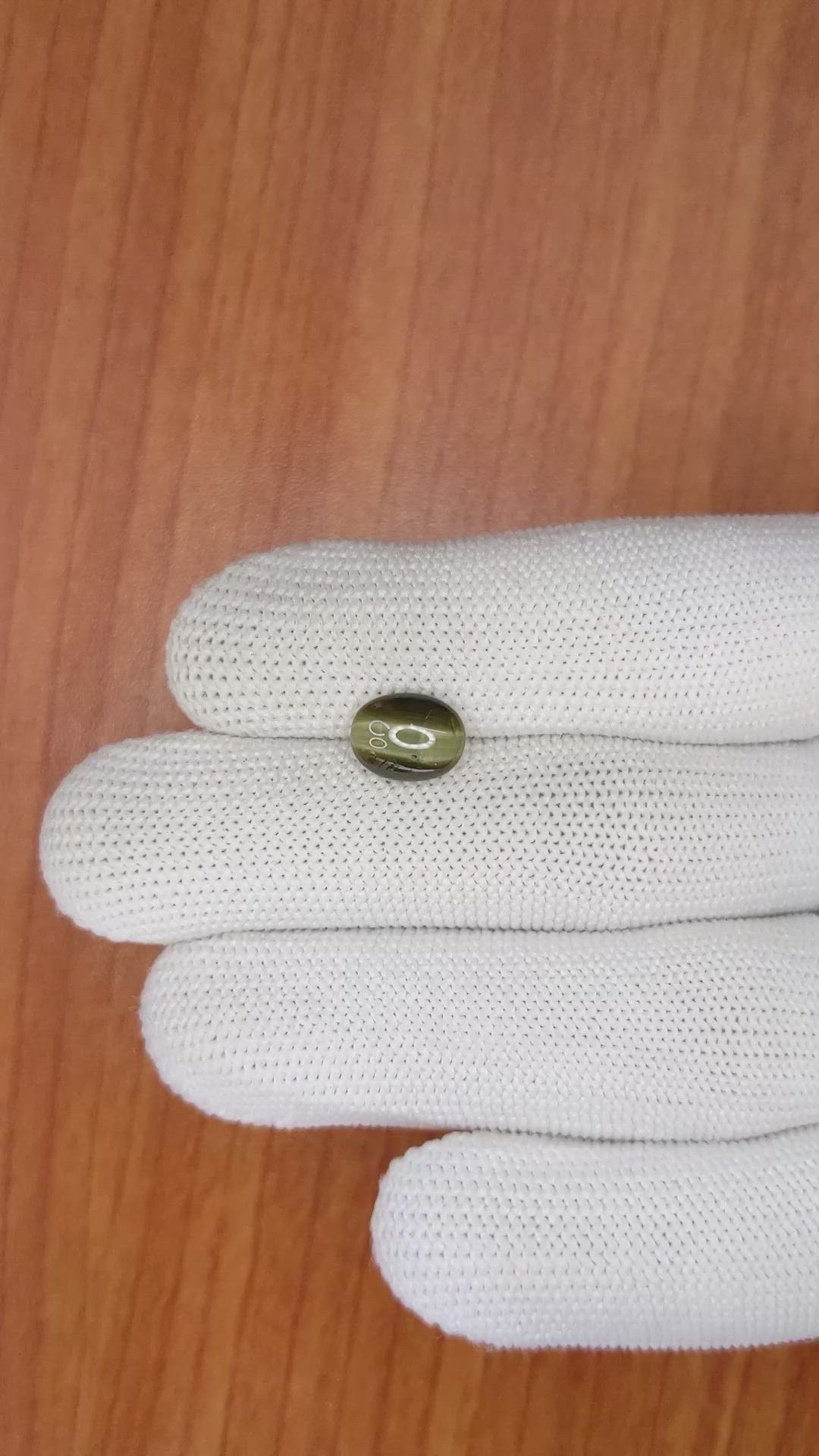 2.56 Ct. Cabochon Kornerupine from Ceylon (Sri Lanka) Size Video