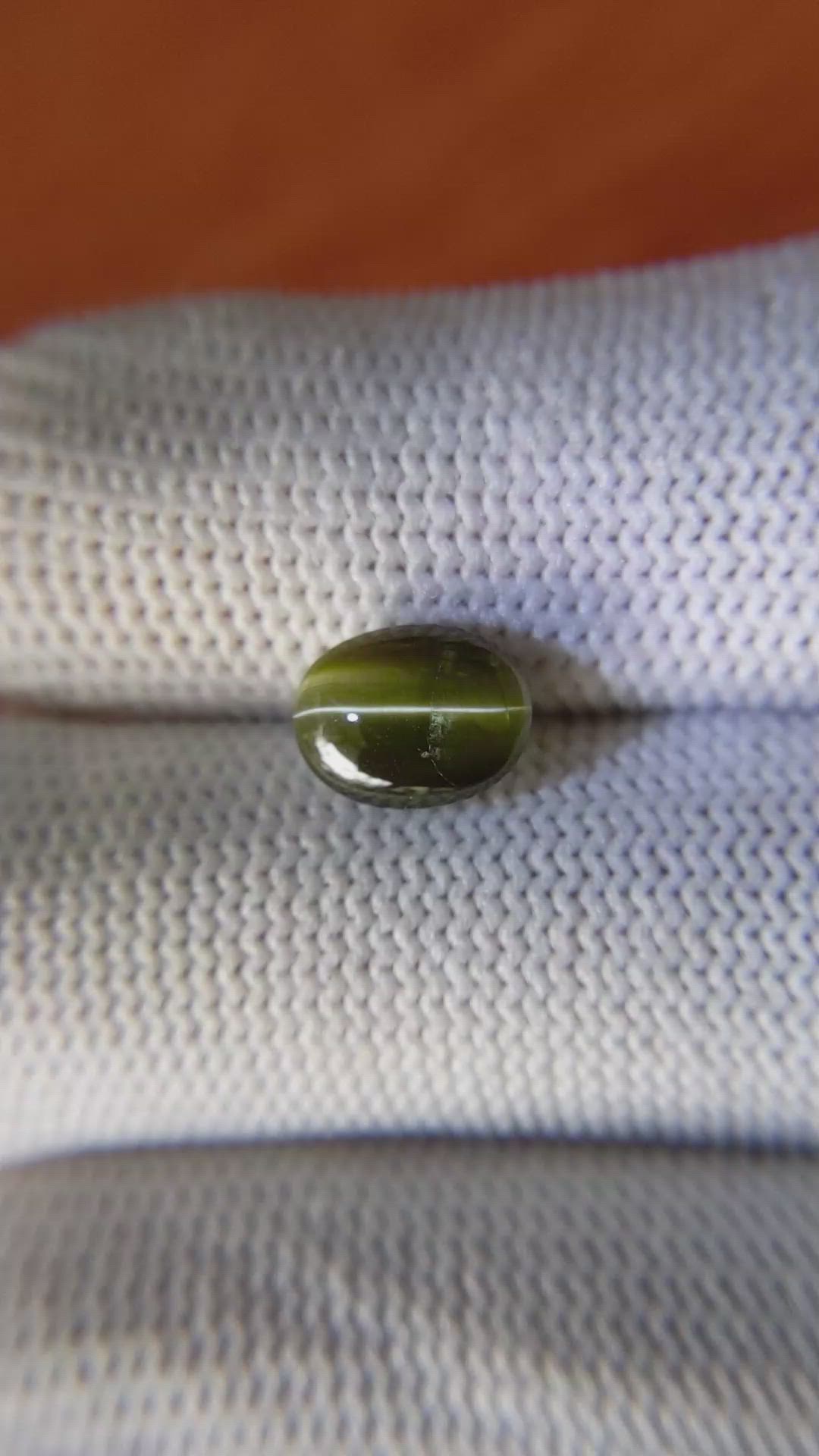 2.56 Ct. Cabochon Kornerupine from Ceylon (Sri Lanka) Size Video