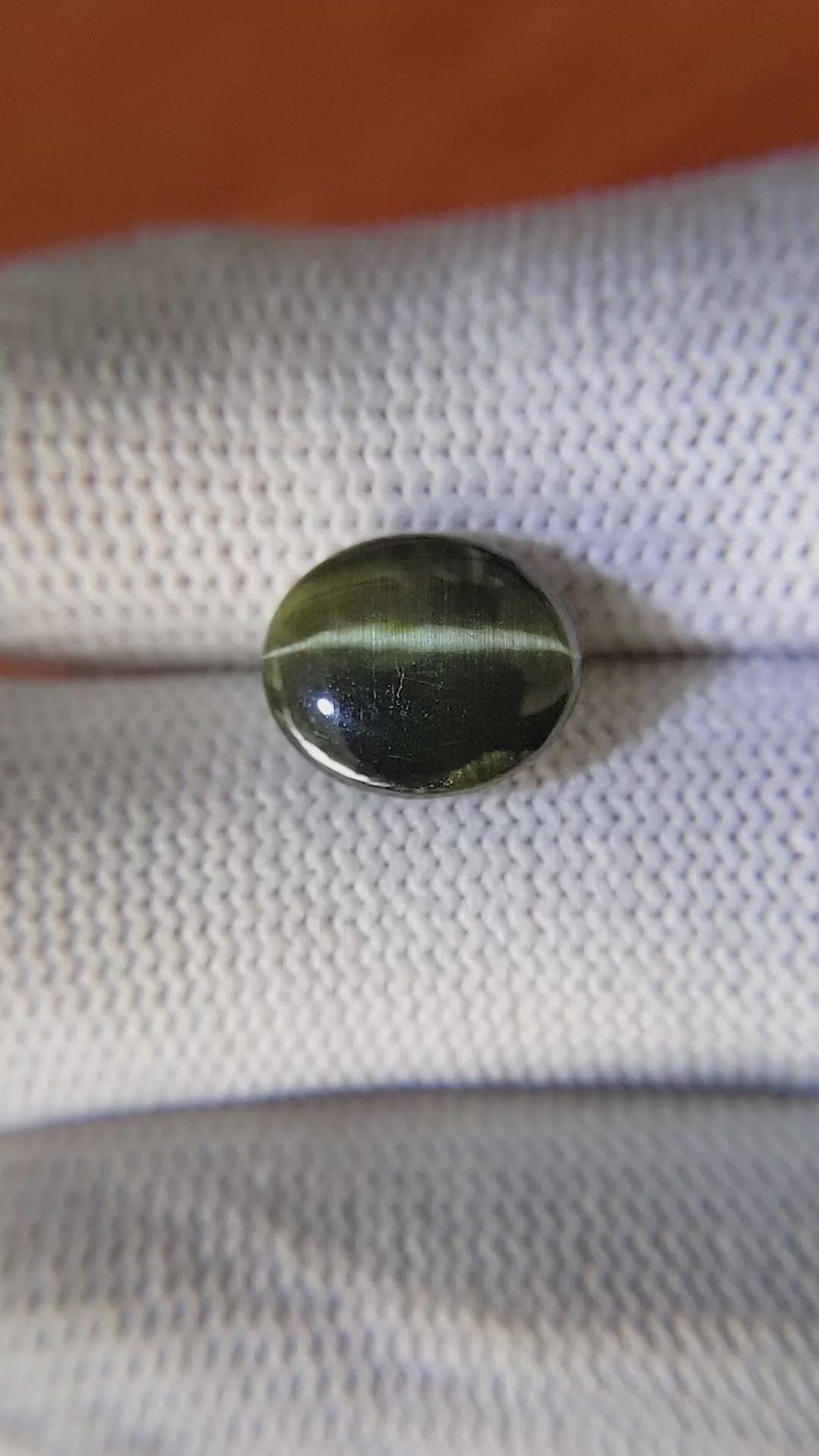 4.94 Ct. Cabochon Kornerupine from Ceylon (Sri Lanka) Size Video