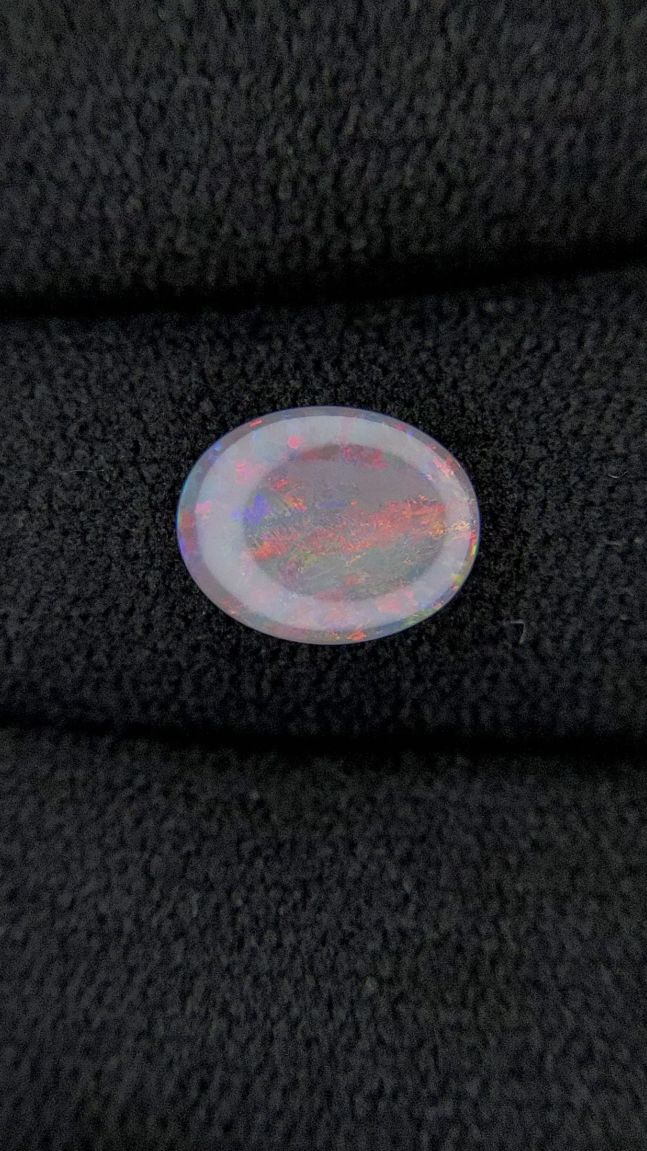 0.70 Ct. Cabochon Semi-Black Opal from Australia Size Video