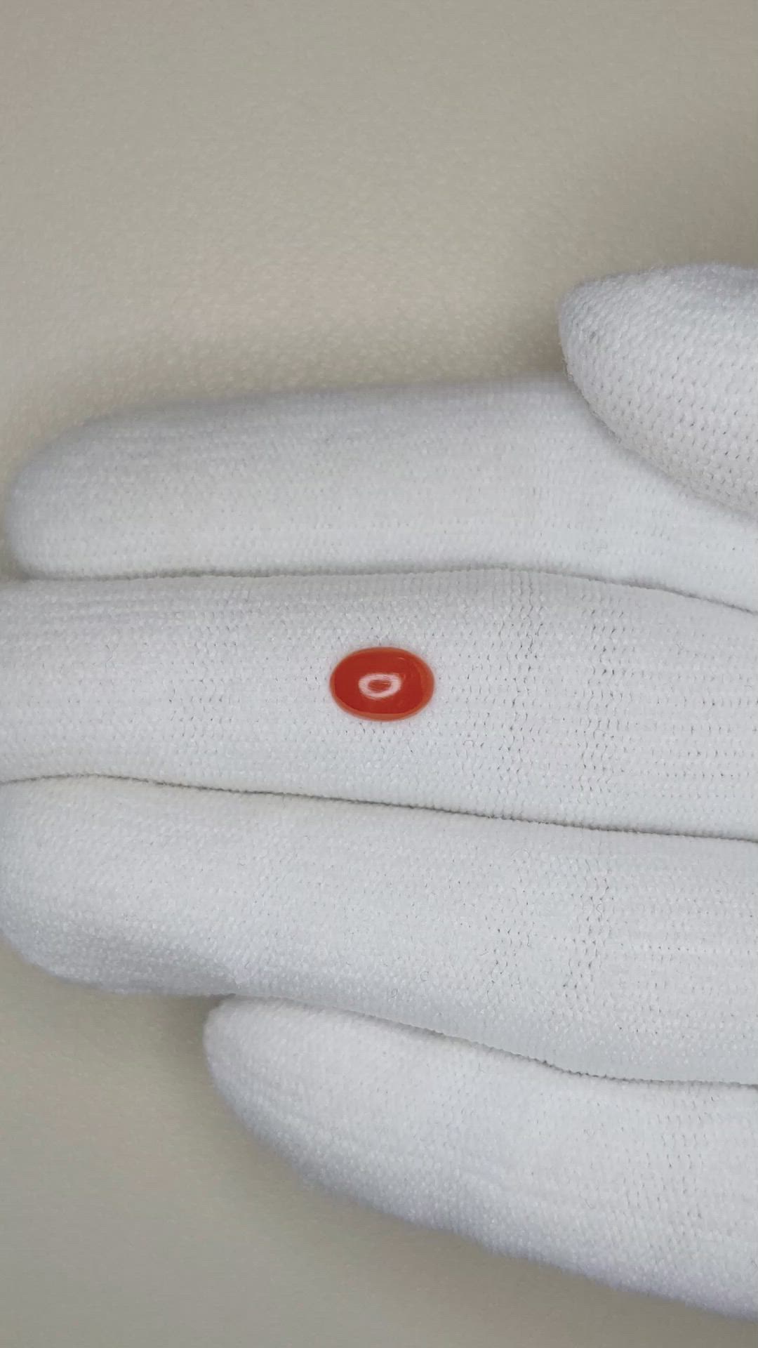 0.49 Ct. Orangish Red Cabochon Coral from Italy Size Video