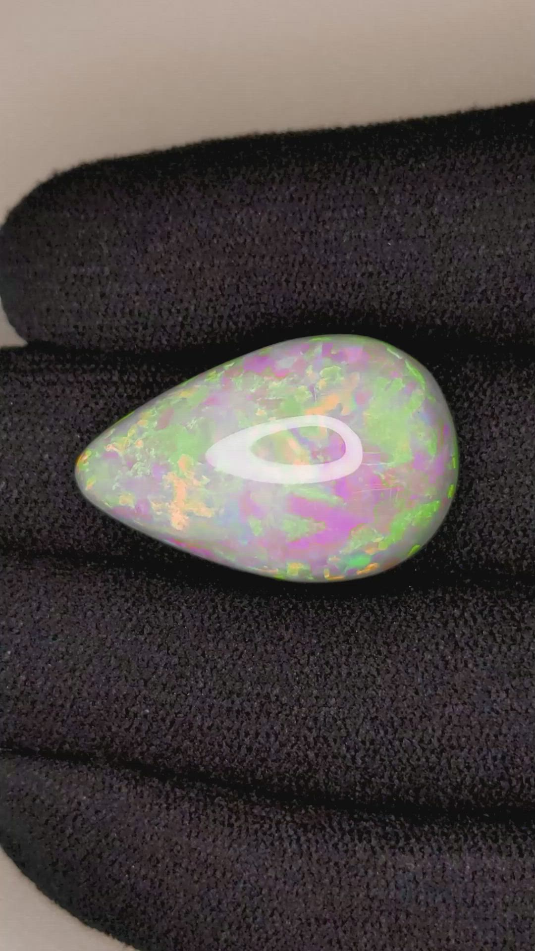 18.97 Ct. Cabochon White Opal from Australia Size Video