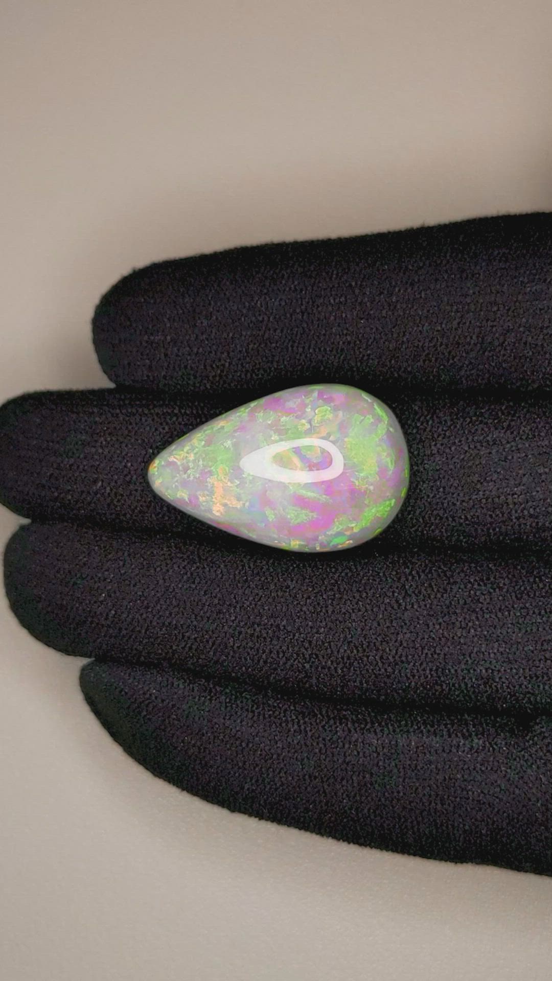 18.97 Ct. Cabochon White Opal from Australia Size Video