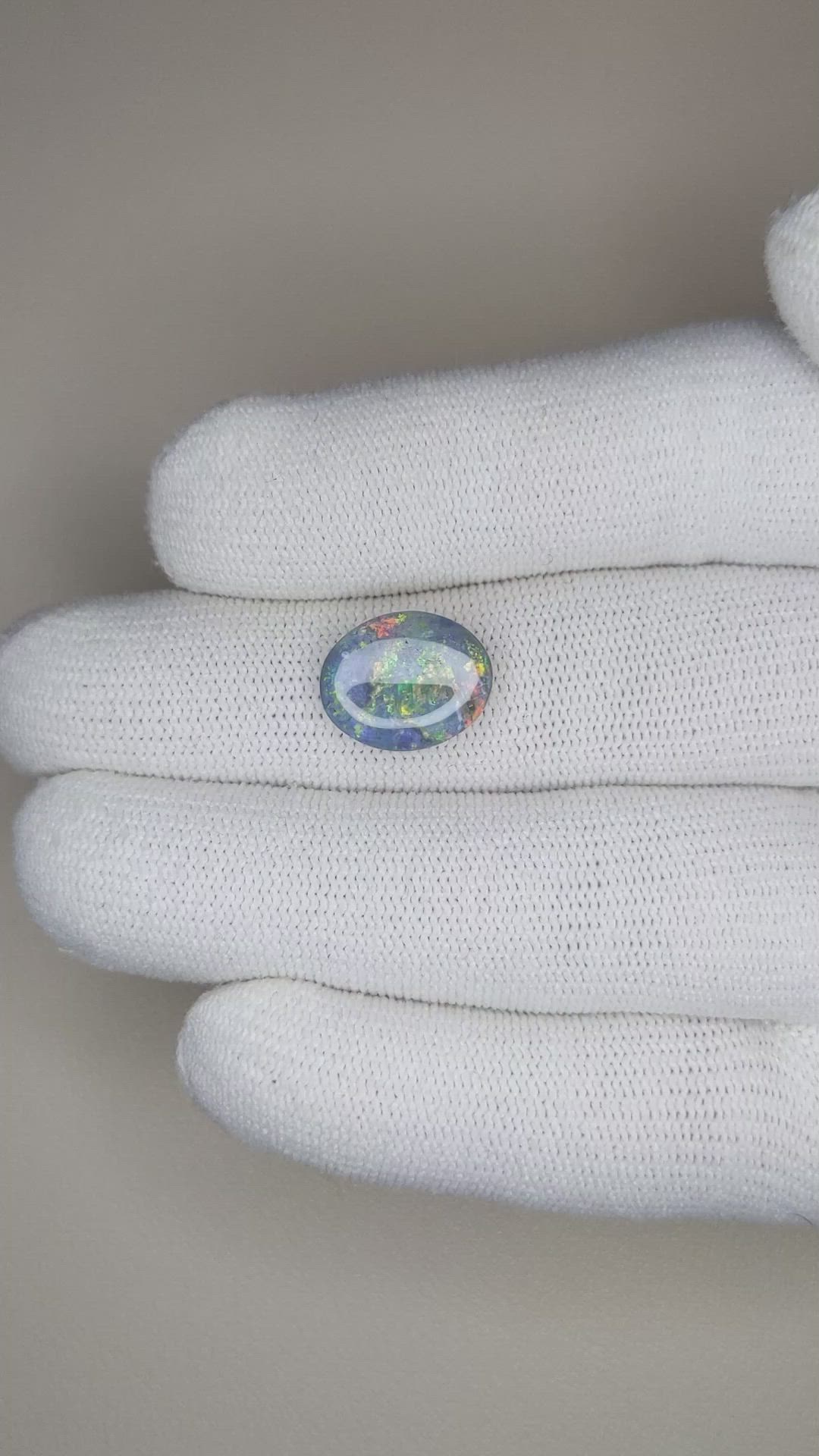 3.68 Ct. Semi-Black Opal from Australia Size Video