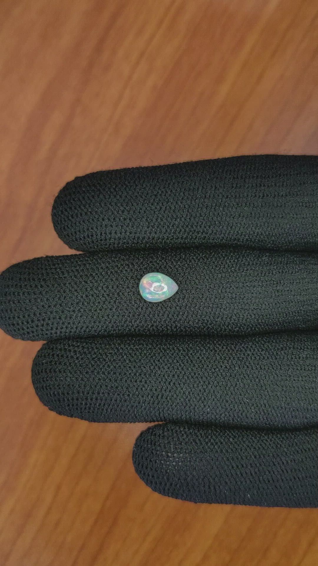 0.68 Ct. Cabochon White Opal from Australia Size Video