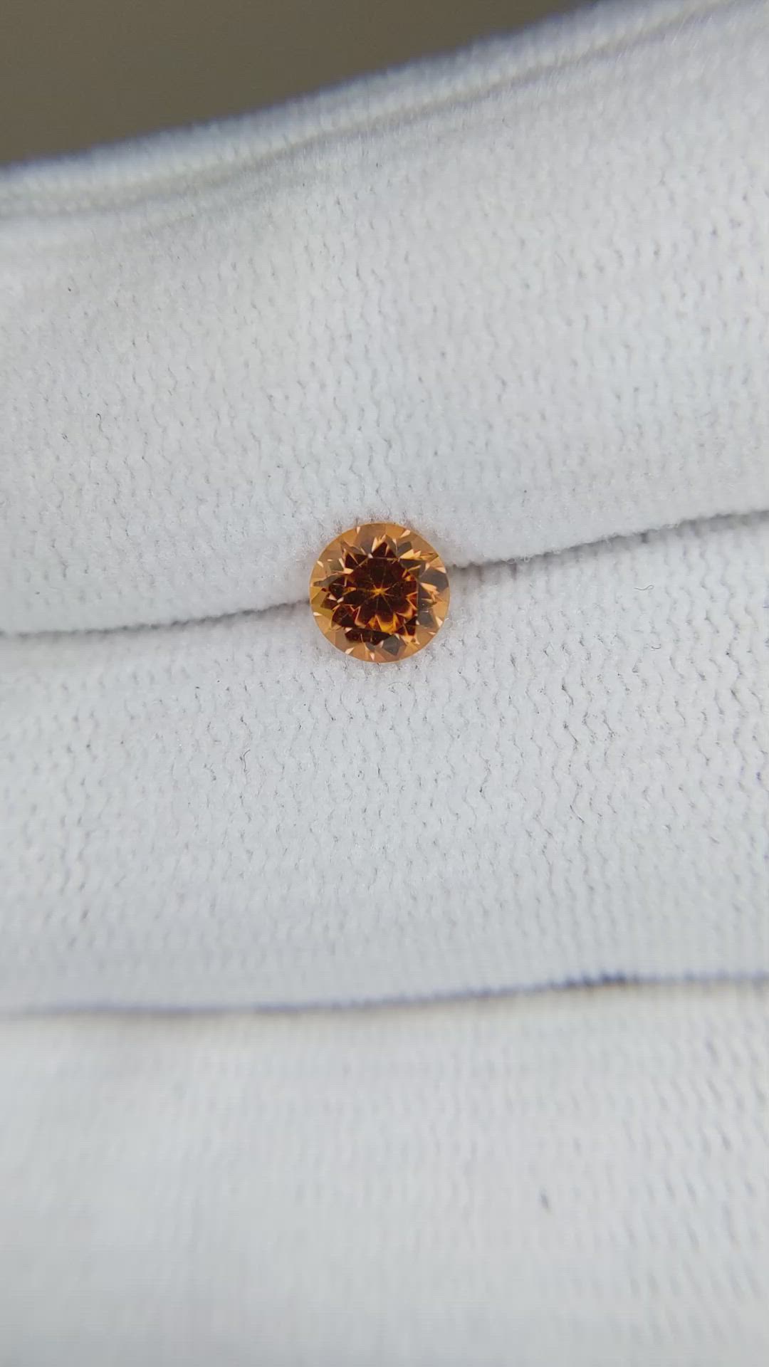 0.81 Ct. Orange Spessartite Garnet from Madagascar Size Video