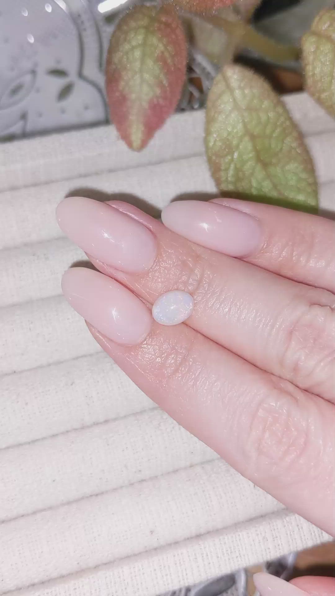 0.78 Ct. Cabochon White Opal from Ethiopia Size Video