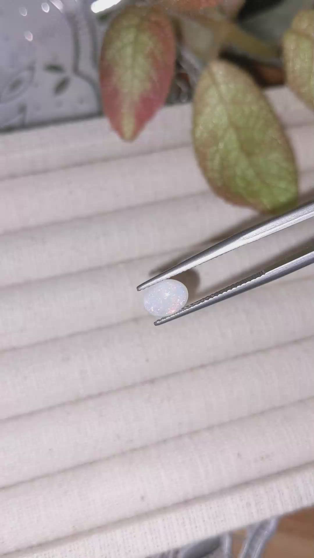 0.78 Ct. Cabochon White Opal from Ethiopia Size Video