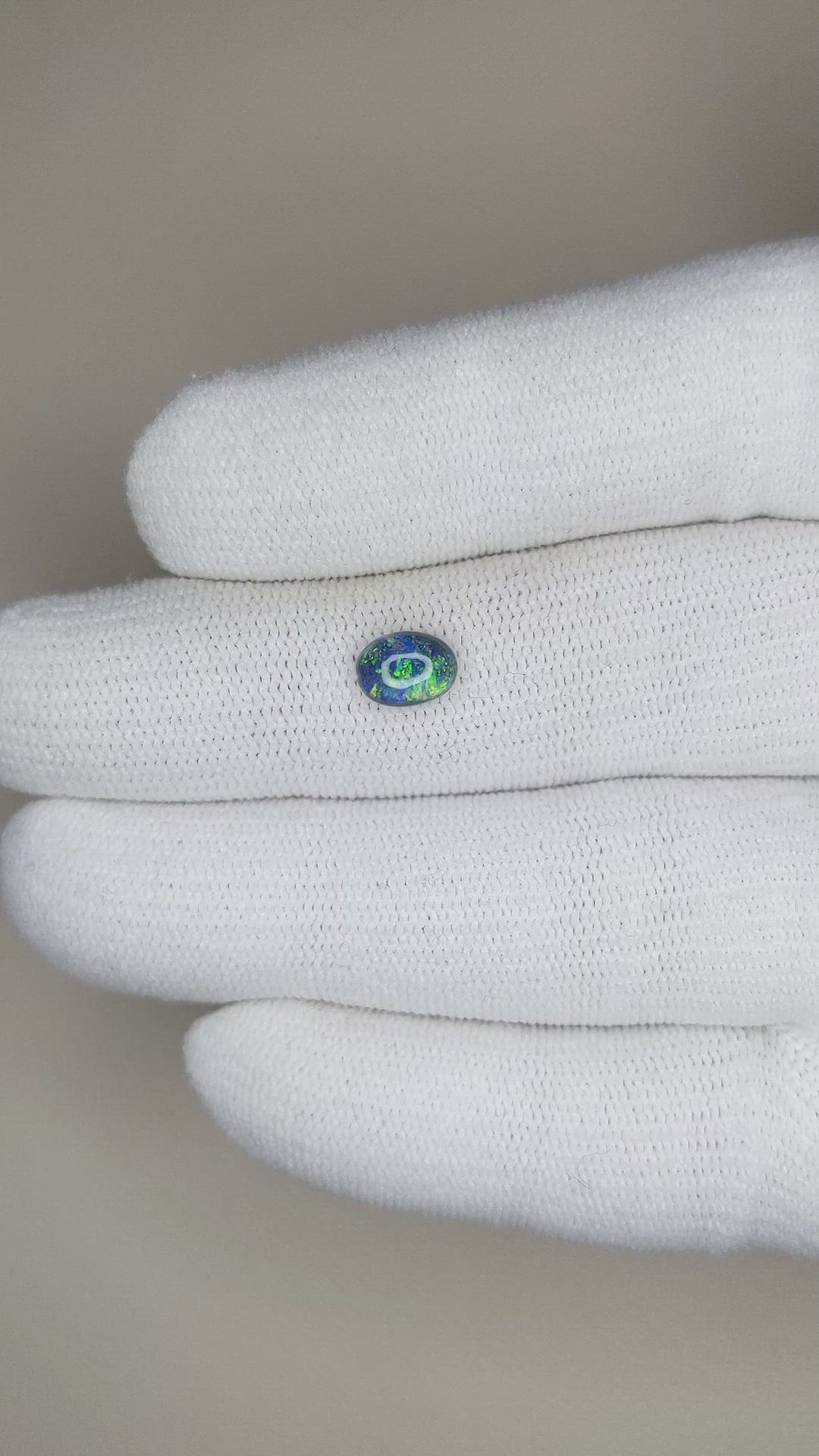 0.70 Ct. Cabochon Black Opal from Australia Size Video