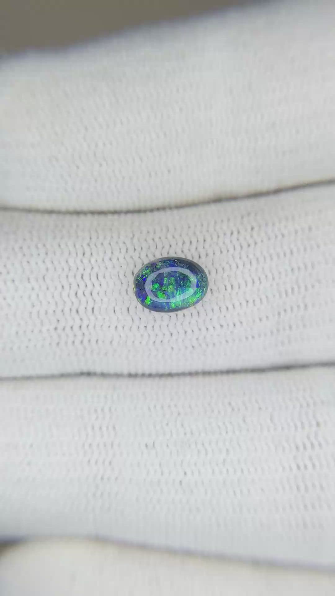 0.70 Ct. Cabochon Black Opal from Australia Size Video