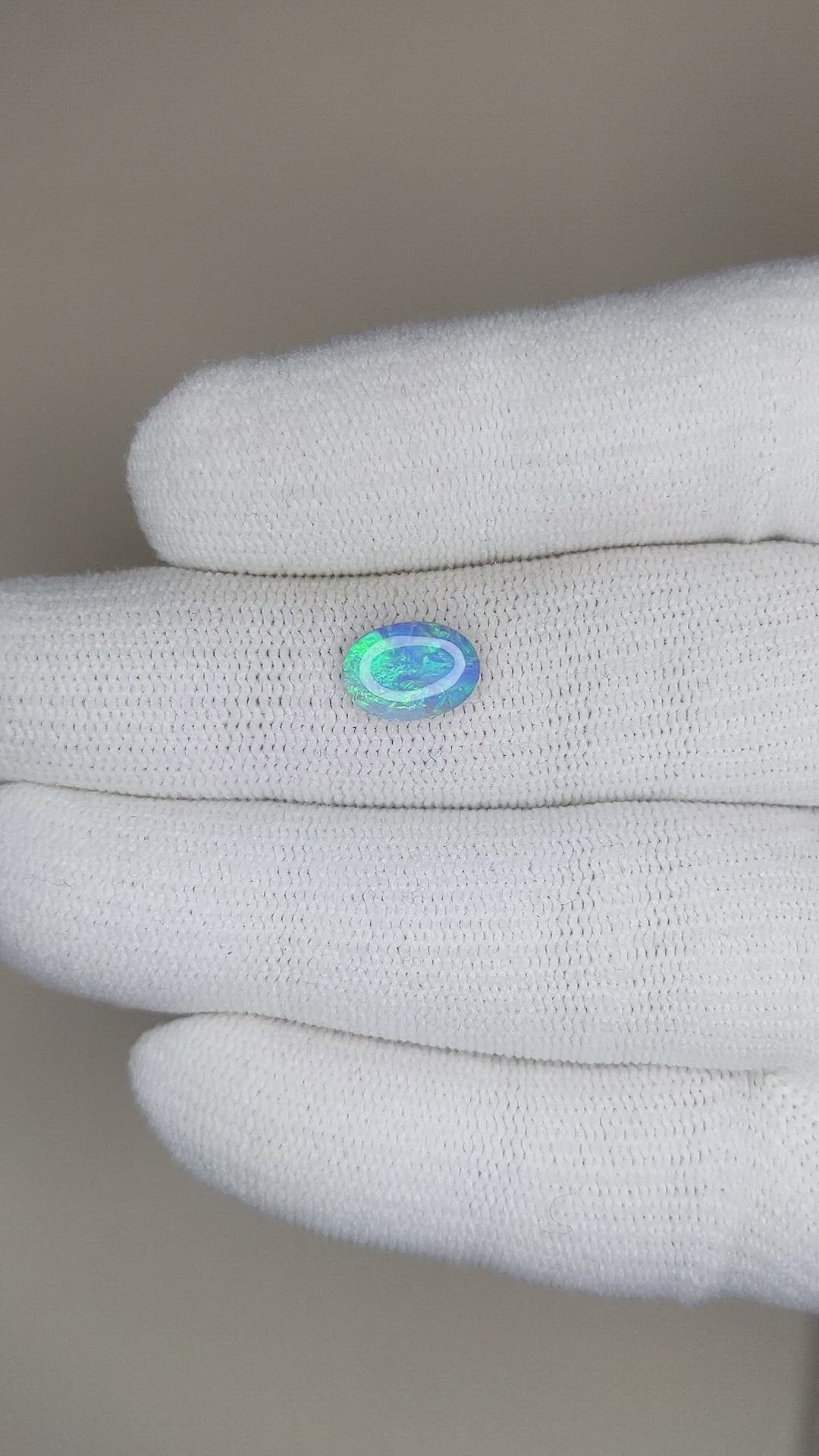 0.81 Ct. Cabochon Semi-Black Opal from Australia Size Video