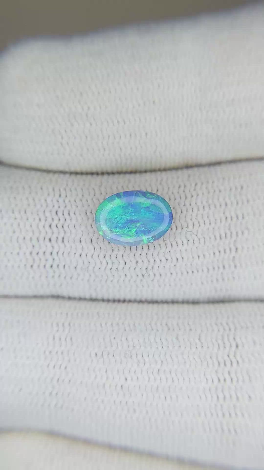 0.81 Ct. Cabochon Semi-Black Opal from Australia Size Video