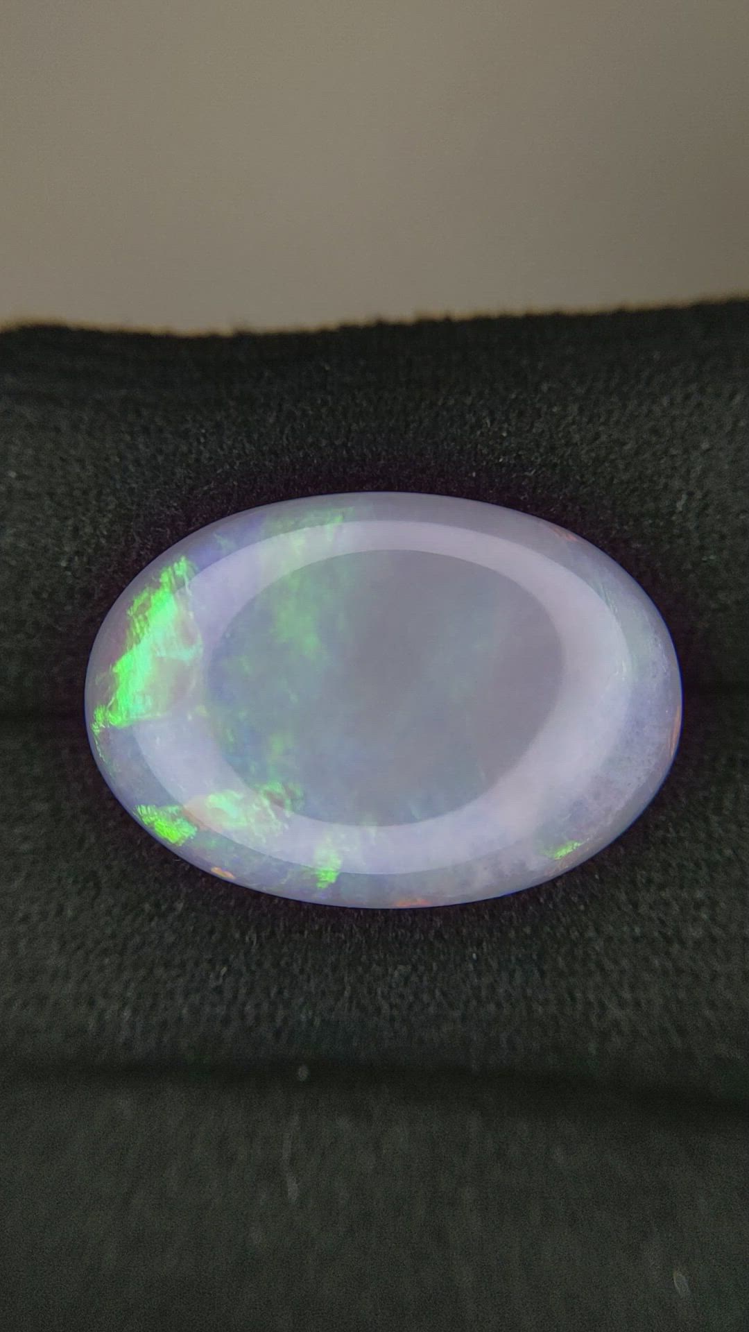 15.83 Ct. Cabochon White Opal from Australia Size Video