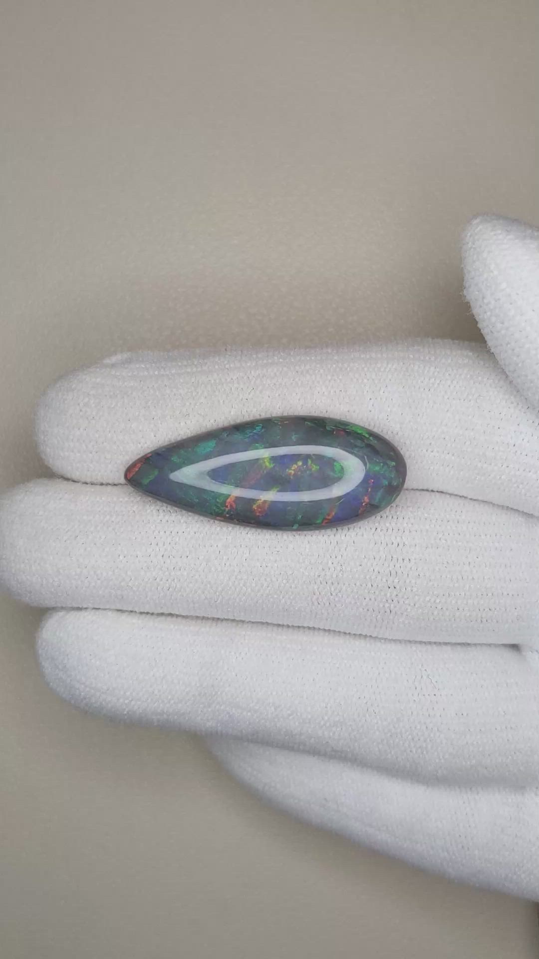 10.58 Ct. Cabochon Black Opal from Australia Size Video
