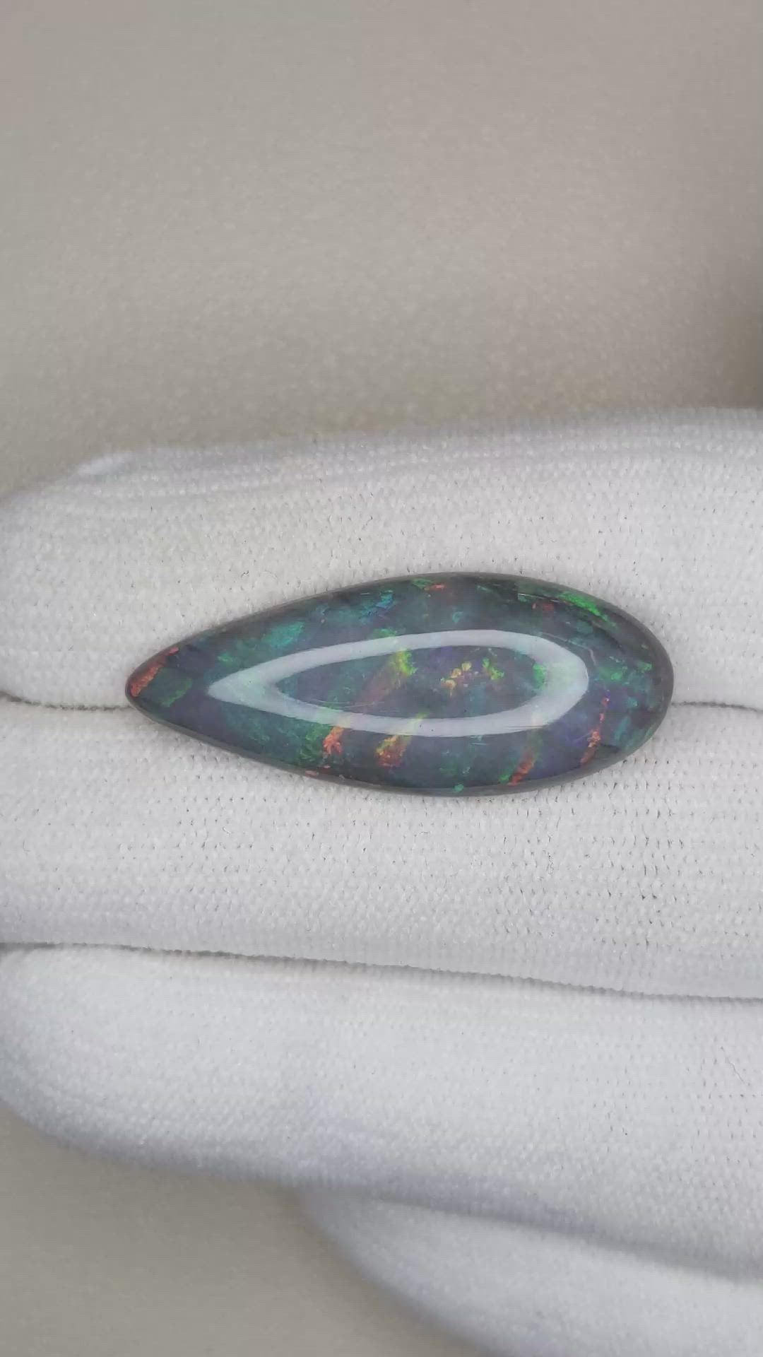 10.58 Ct. Cabochon Black Opal from Australia Size Video