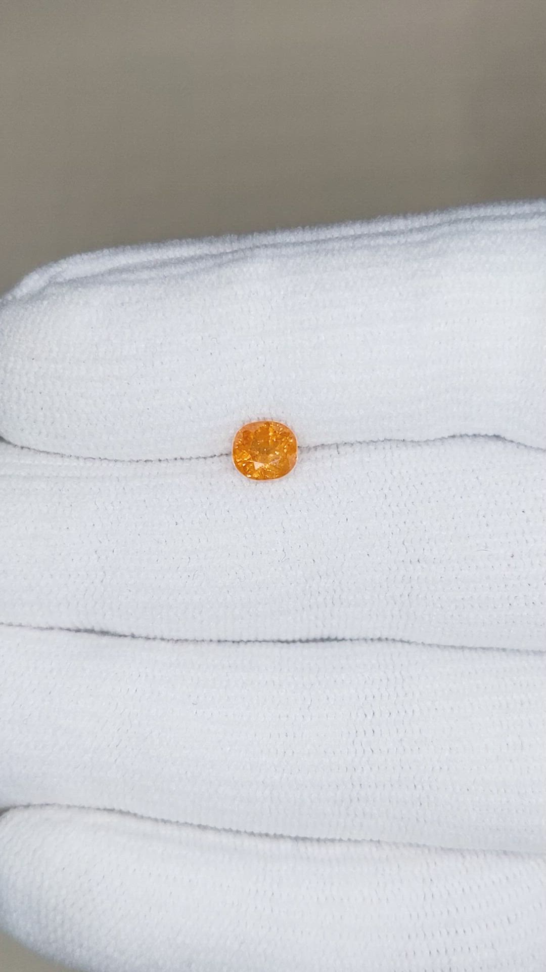 0.88 Ct. Spessartite Garnet from Nigeria Size Video