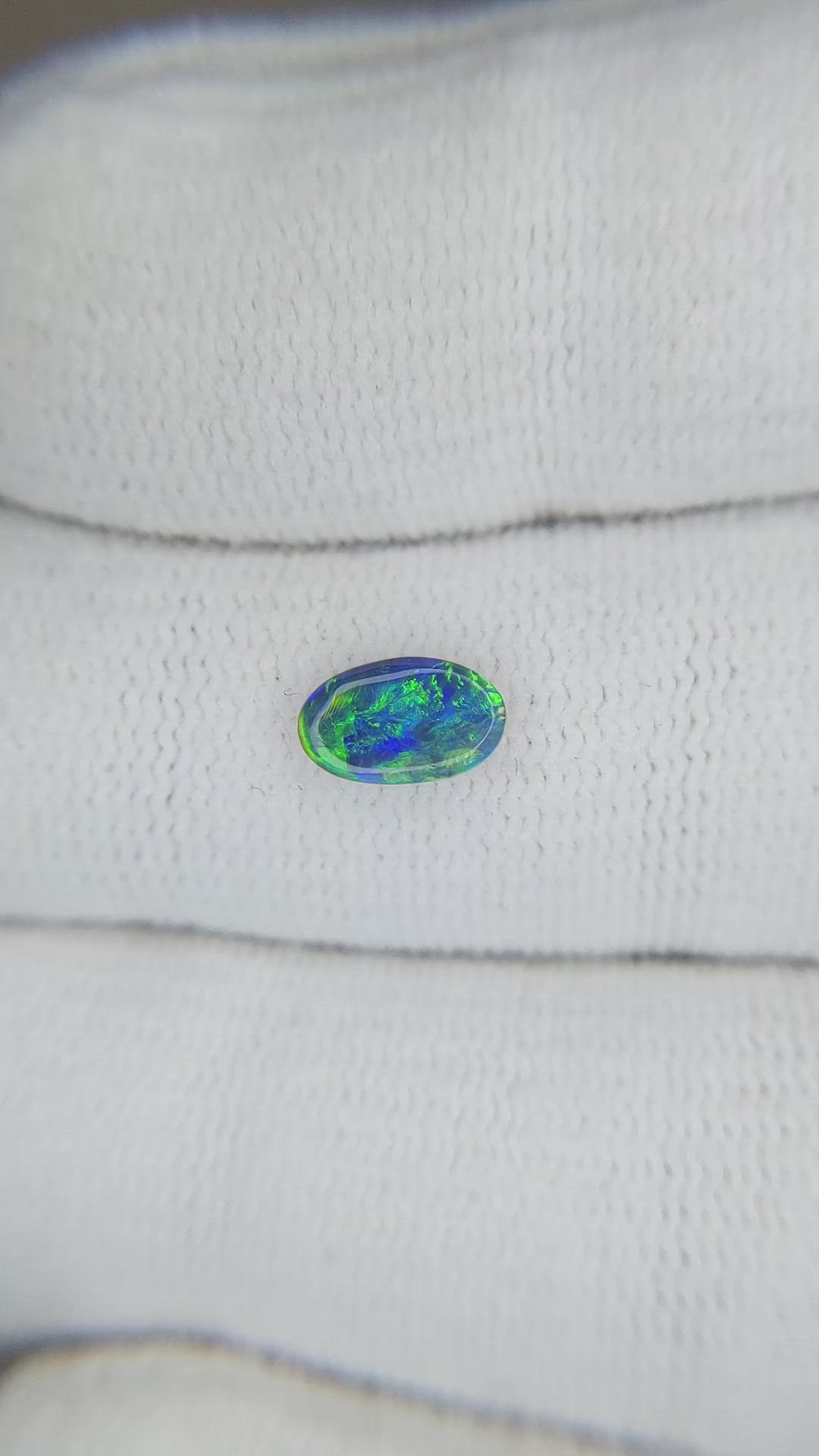 0.39 Ct. Cabochon Black Opal from Australia Size Video