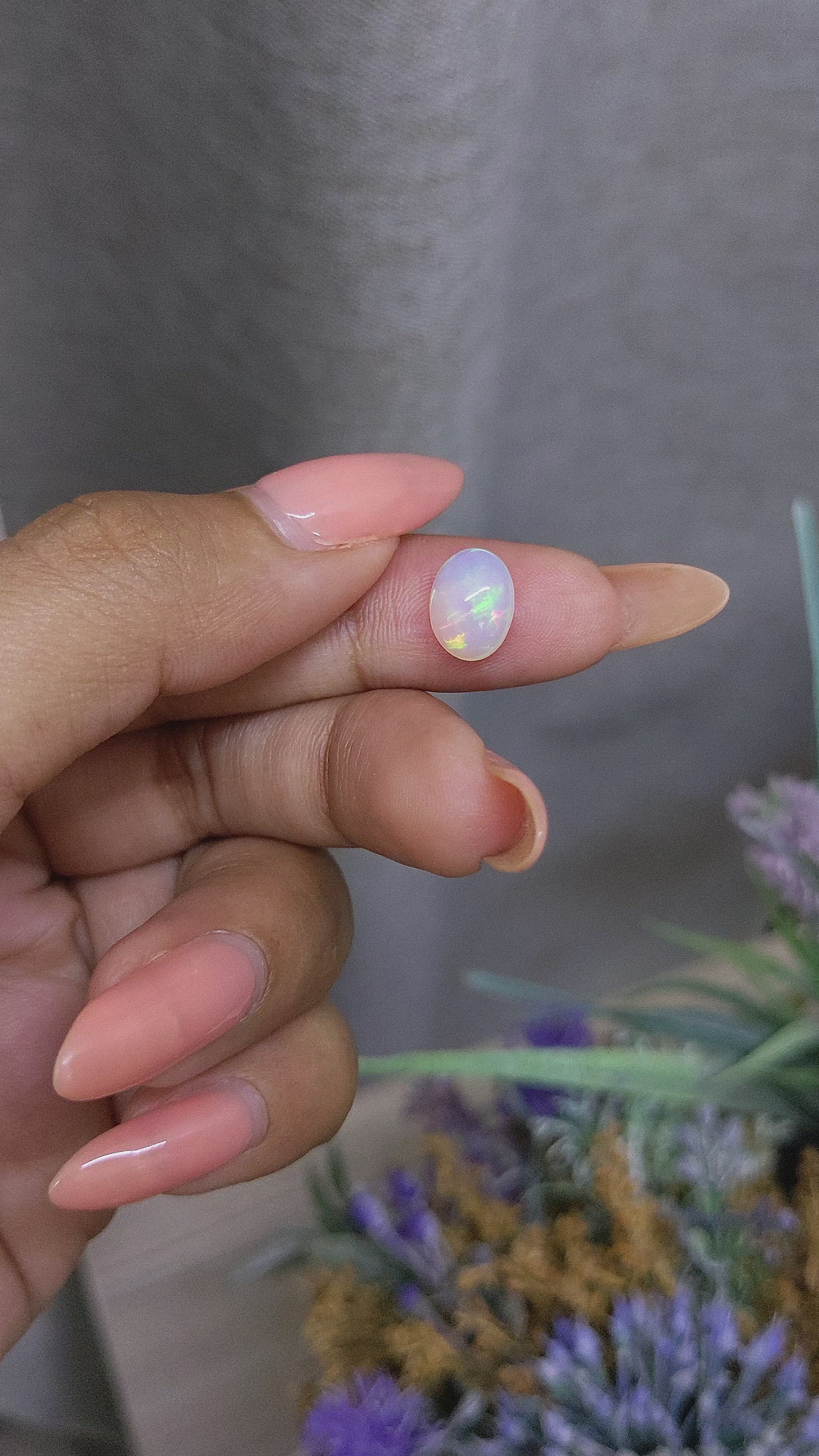 1.58 Ct. Multi Color Cabochon White Opal from Ethiopia Size Video
