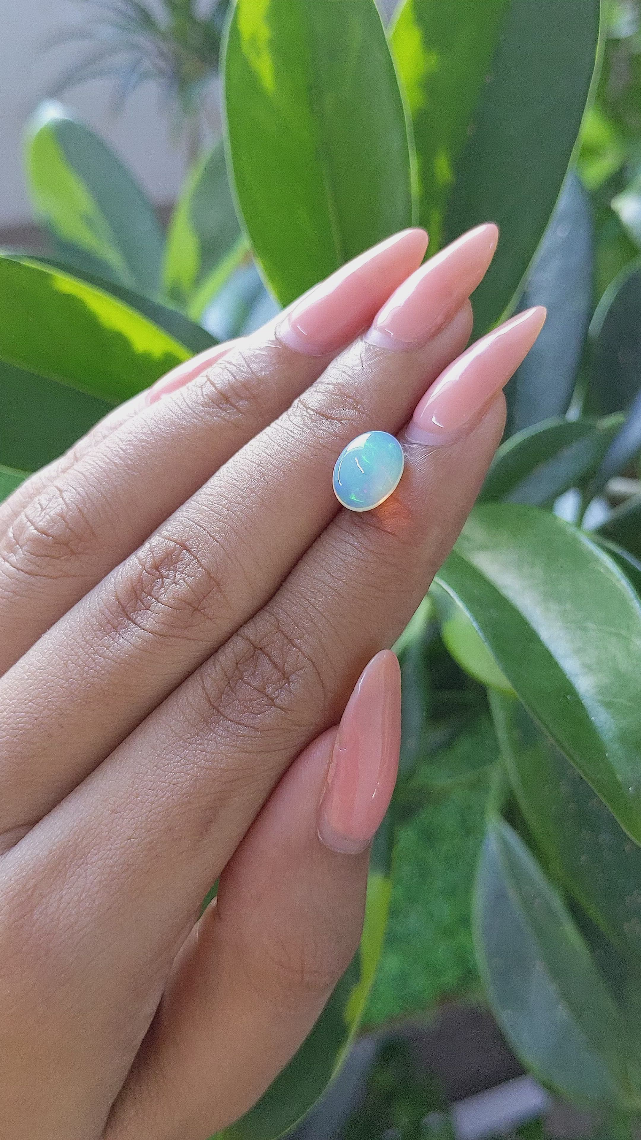 1.58 Ct. Multi Color Cabochon White Opal from Ethiopia Size Video