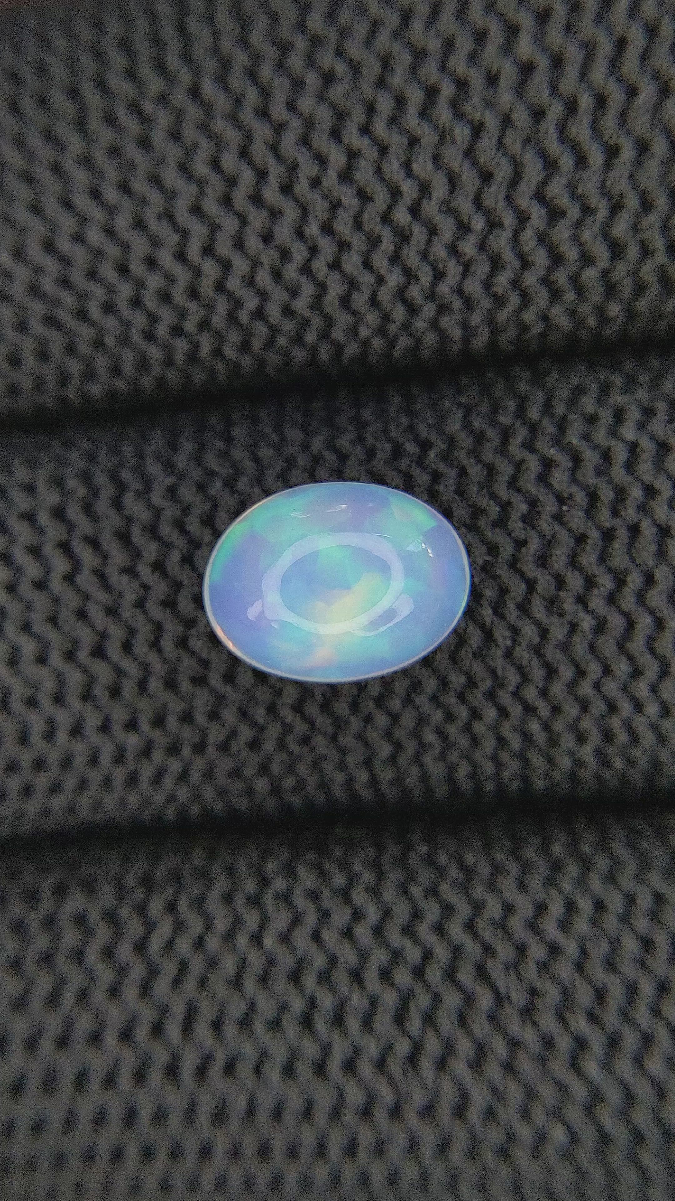 1.58 Ct. Multi Color Cabochon White Opal from Ethiopia Size Video