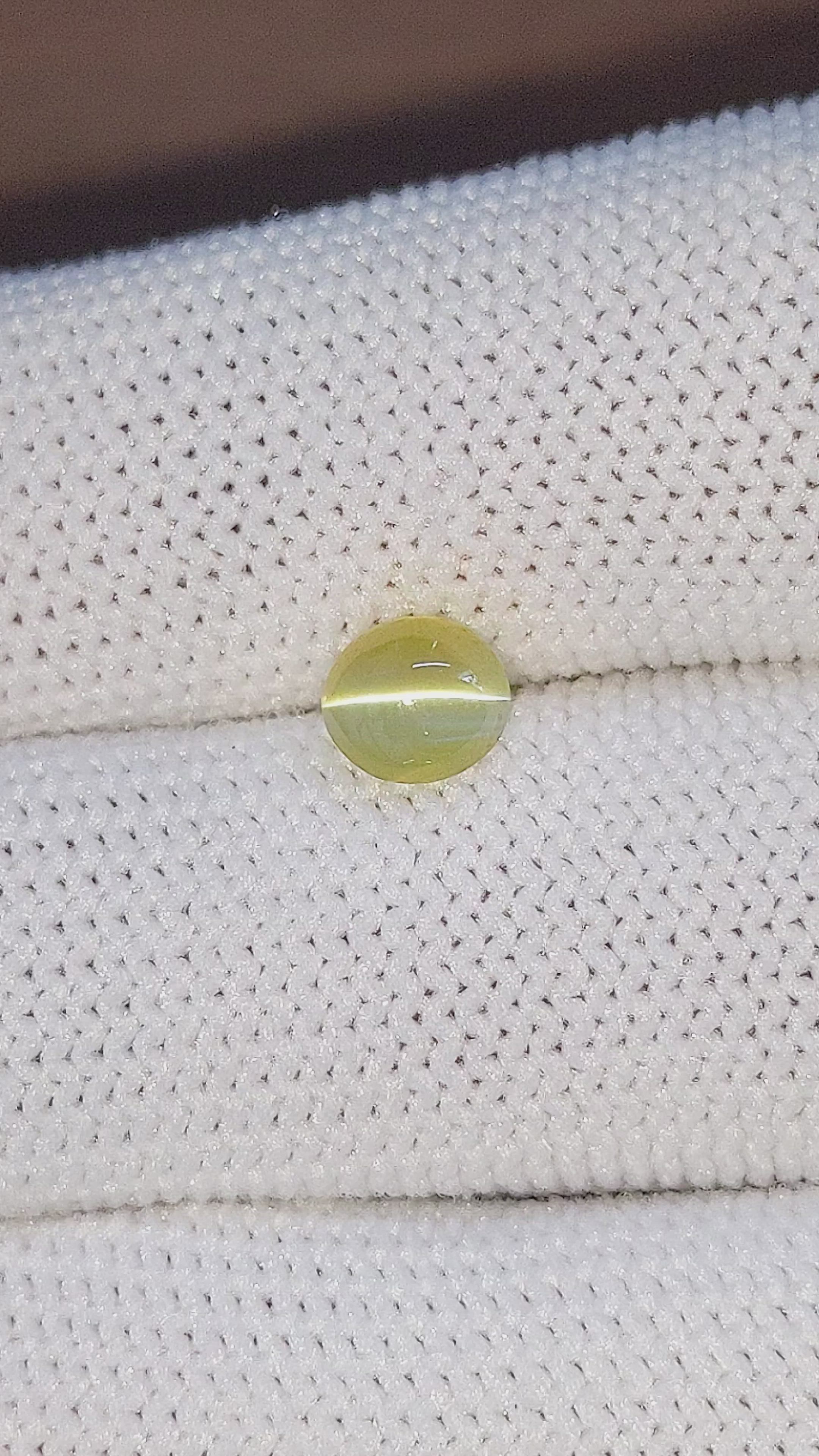 1.21 Ct. Greenish Yellow Cabochon Chrysoberyl from Ceylon (Sri Lanka) Size Video