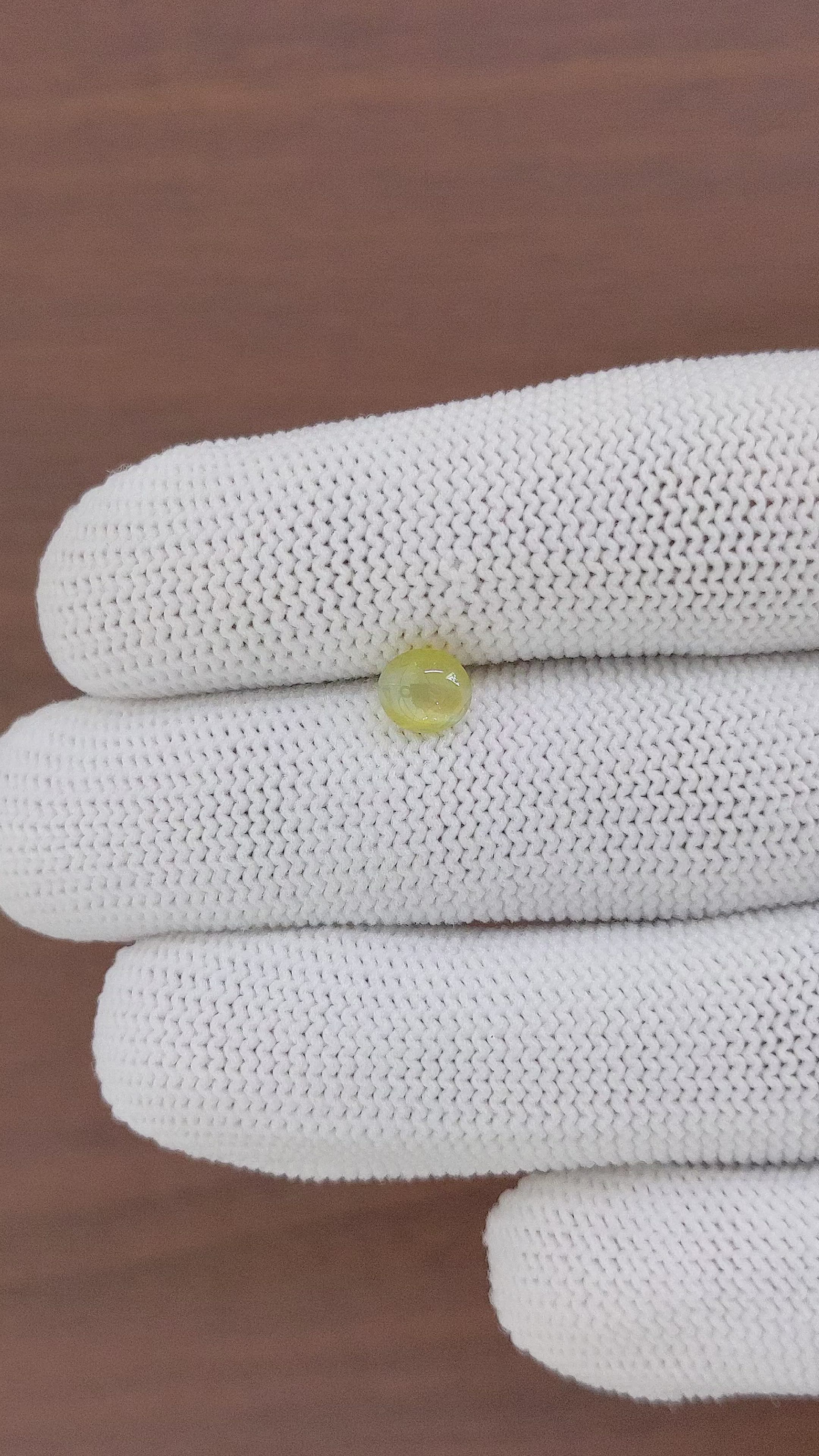1.21 Ct. Greenish Yellow Cabochon Chrysoberyl from Ceylon (Sri Lanka) Size Video