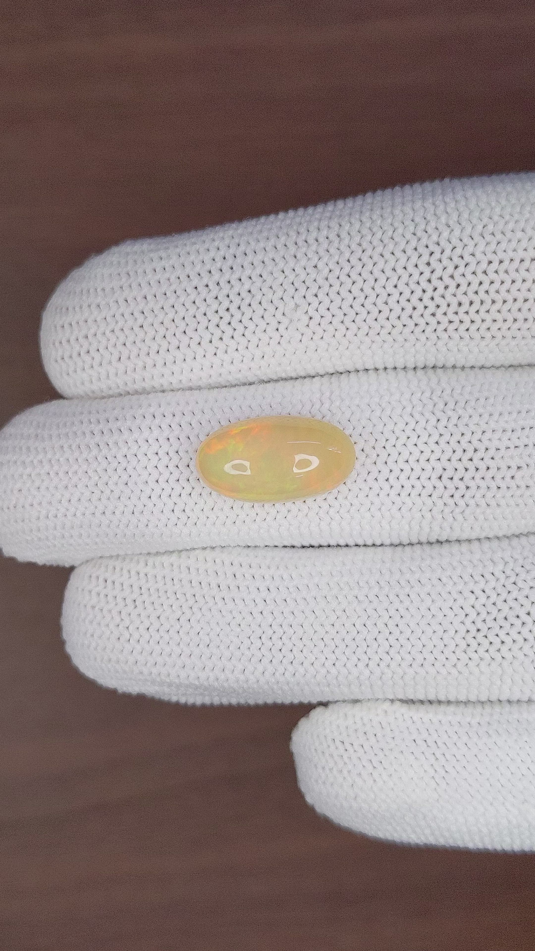 5.34 Ct. Multi Color Cabochon White Opal from Ethiopia Size Video