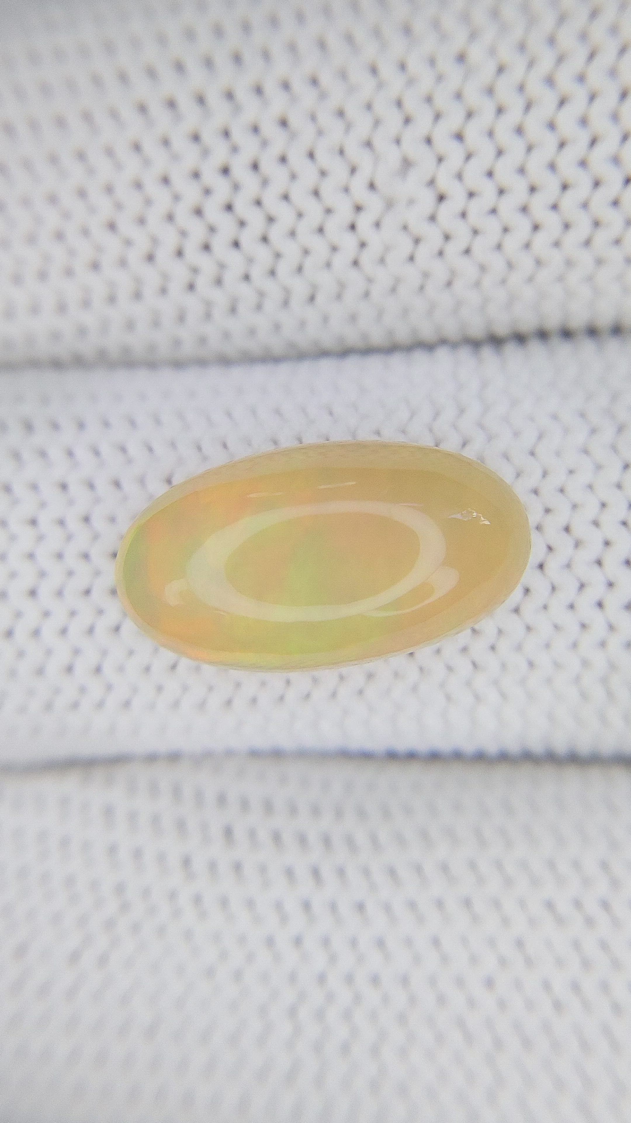 5.34 Ct. Multi Color Cabochon White Opal from Ethiopia Size Video