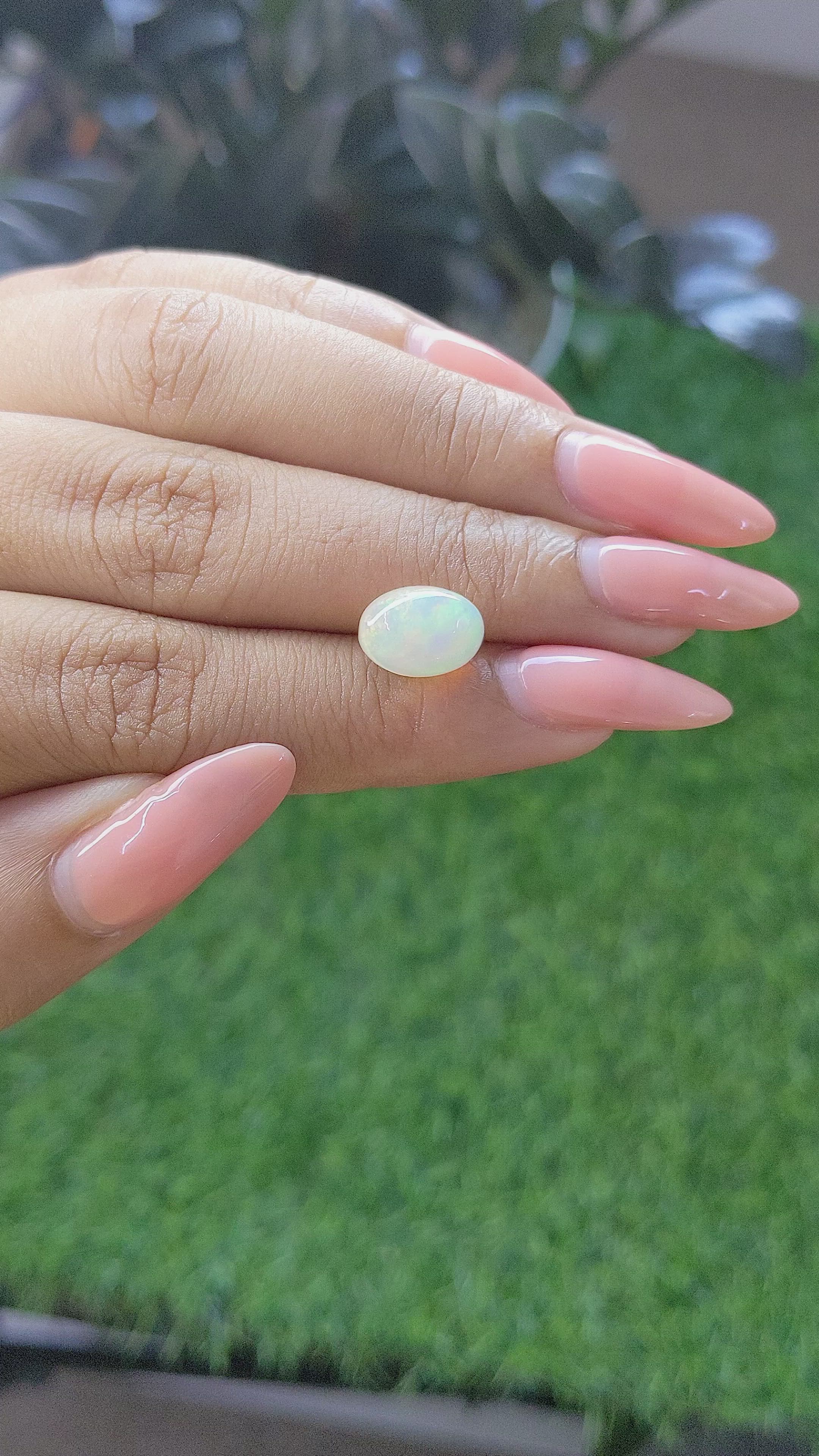 2.51 Ct. Multi Color Cabochon White Opal from Ethiopia Size Video