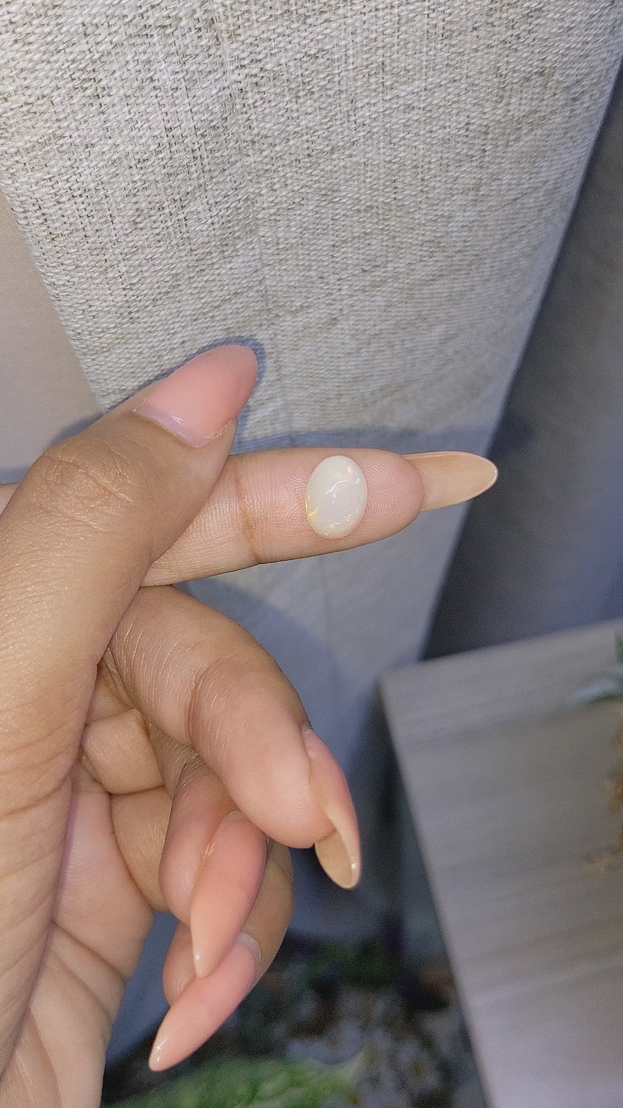 2.07 Ct. Multi Color Cabochon White Opal from Ethiopia Size Video