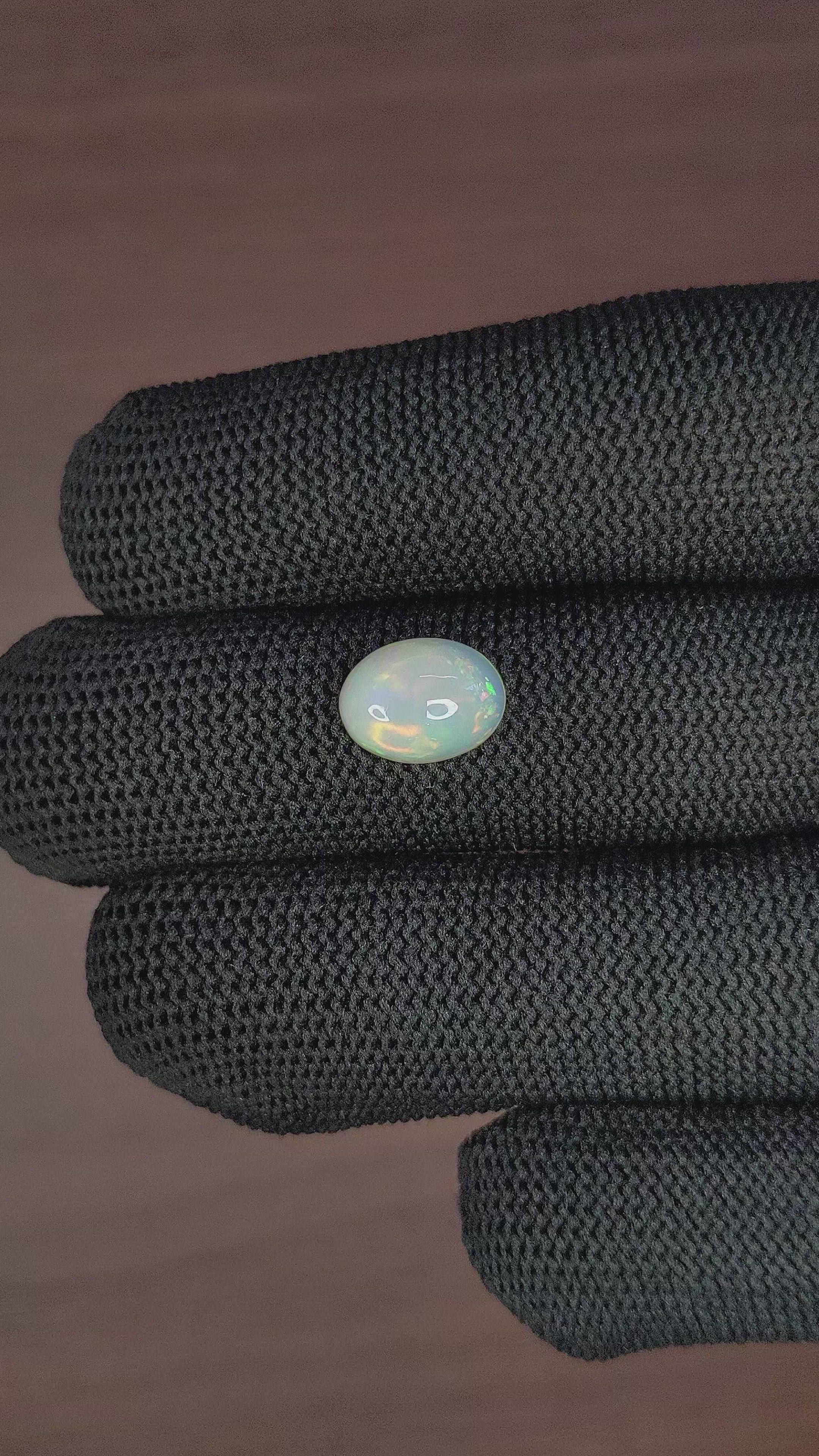 2.07 Ct. Multi Color Cabochon White Opal from Ethiopia Size Video