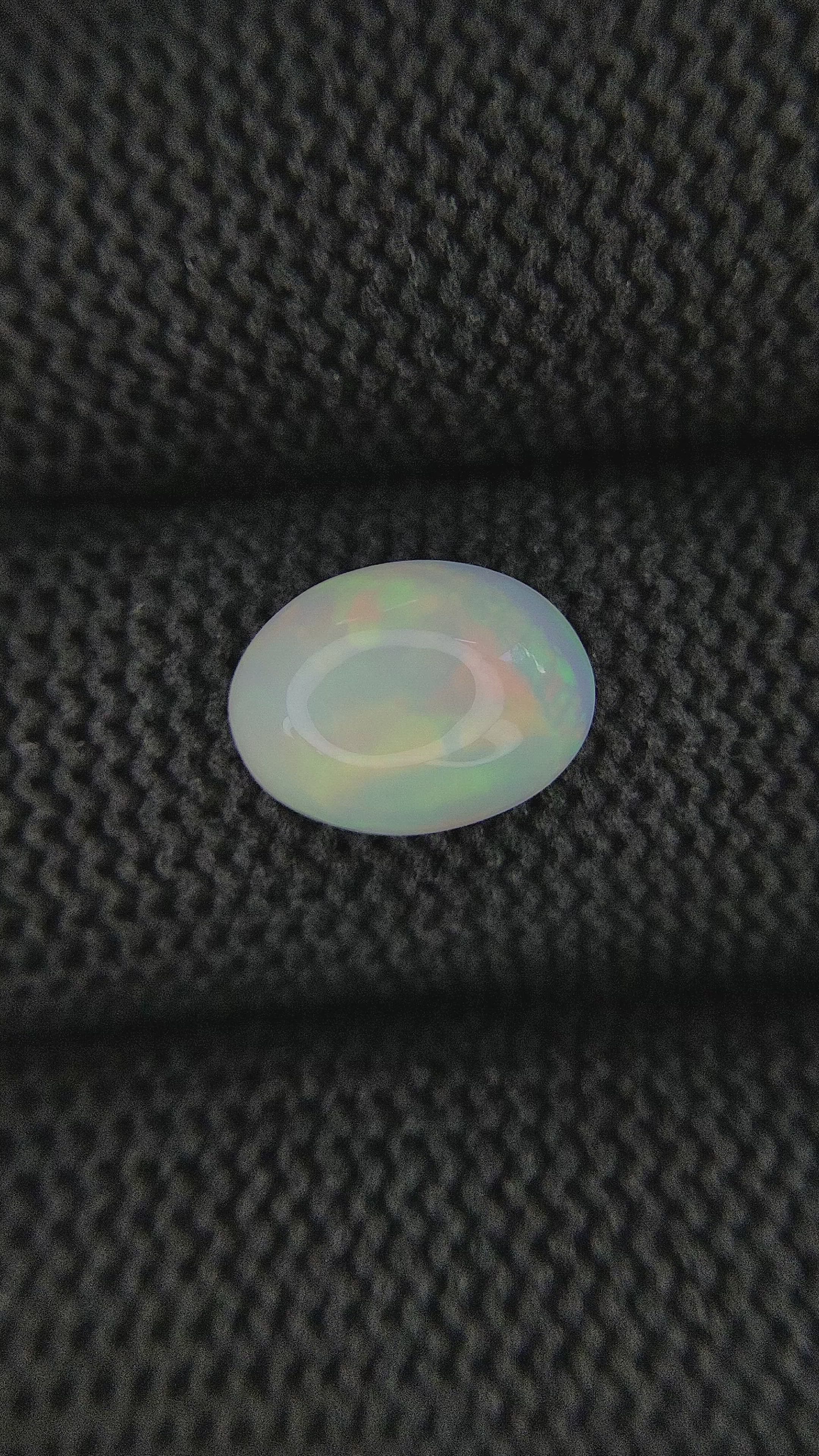 2.07 Ct. Multi Color Cabochon White Opal from Ethiopia Size Video
