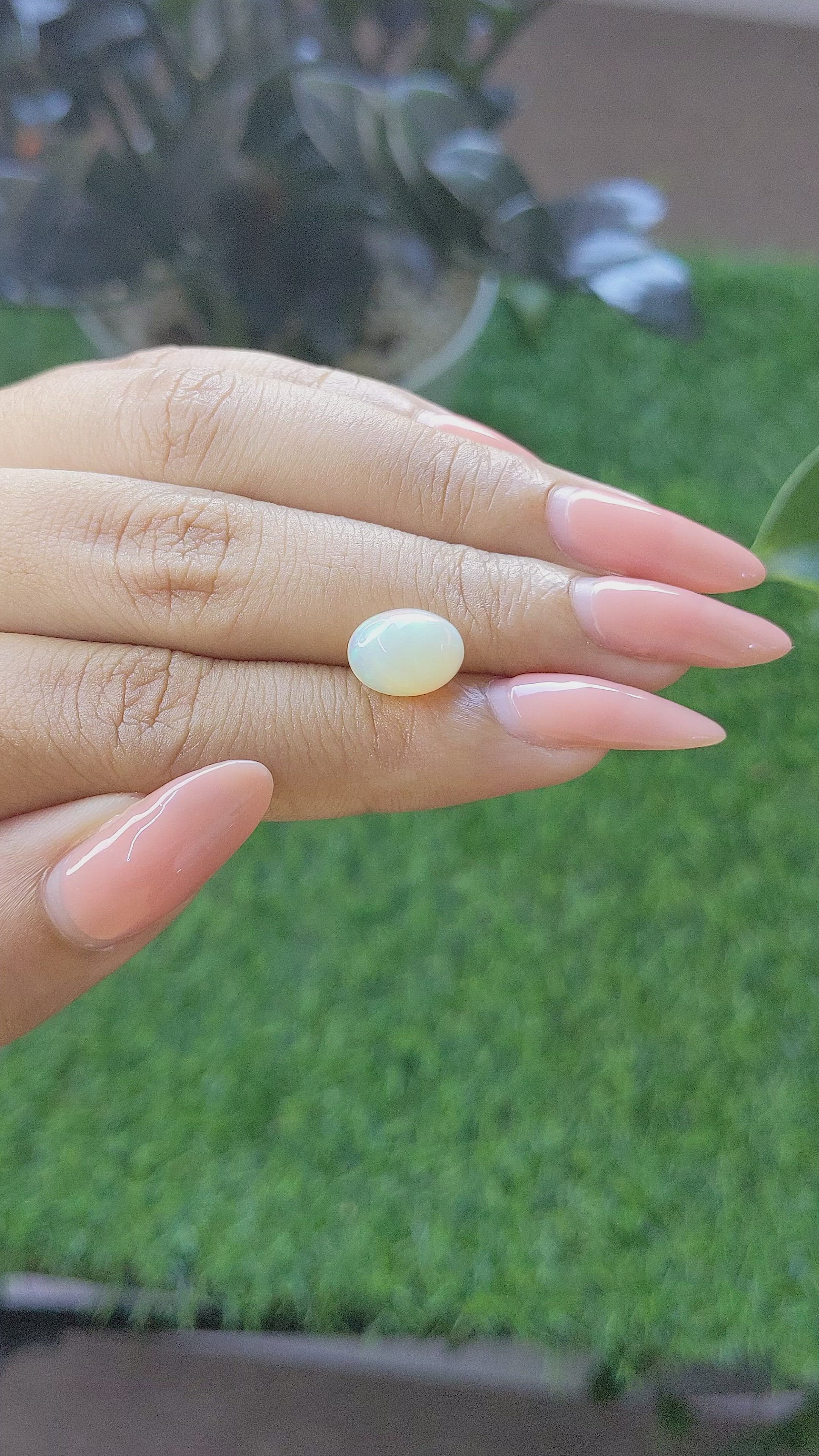 2.07 Ct. Multi Color Cabochon White Opal from Ethiopia Size Video