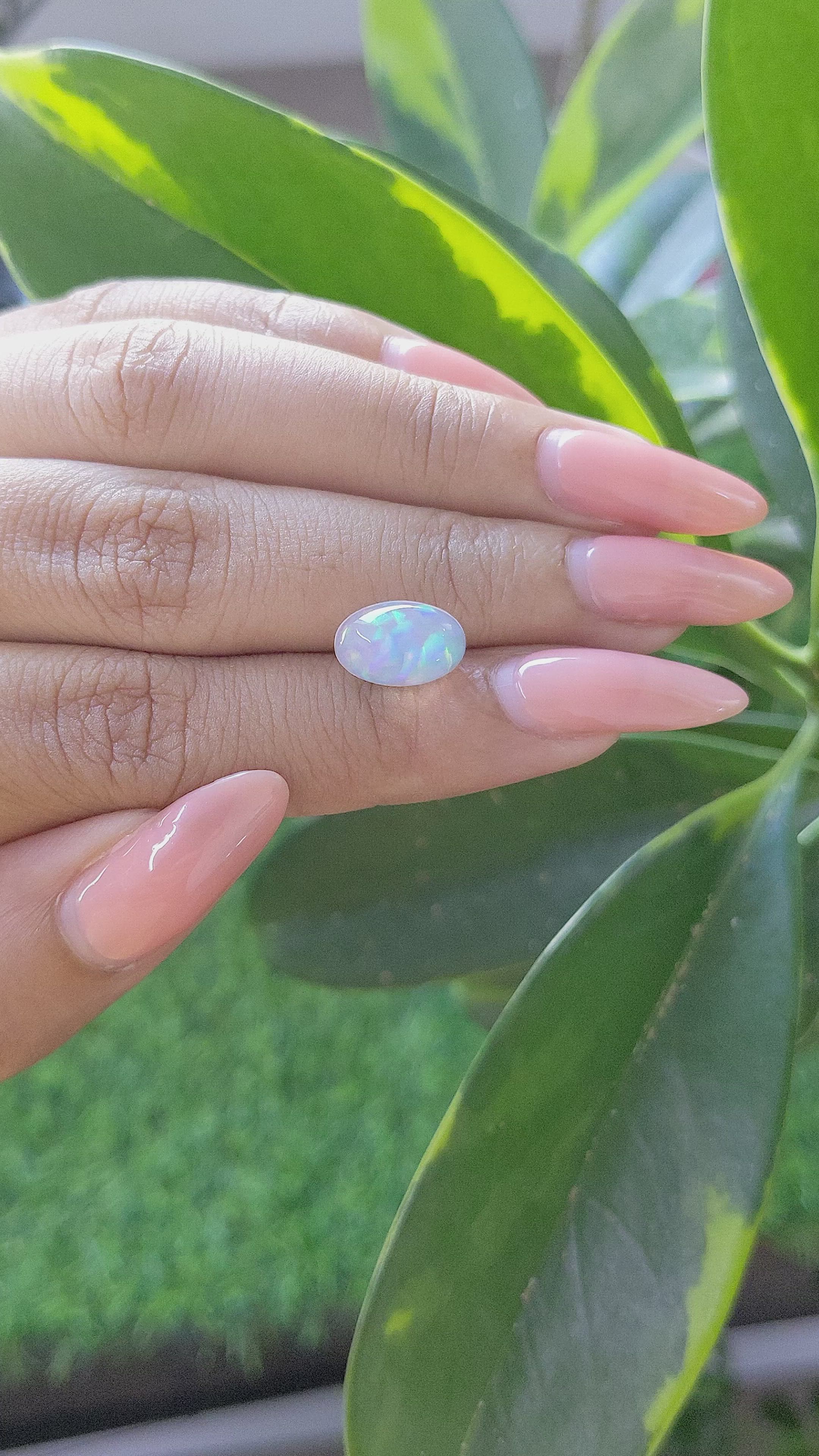 1.76 Ct. Multi Color Cabochon White Opal from Ethiopia Size Video