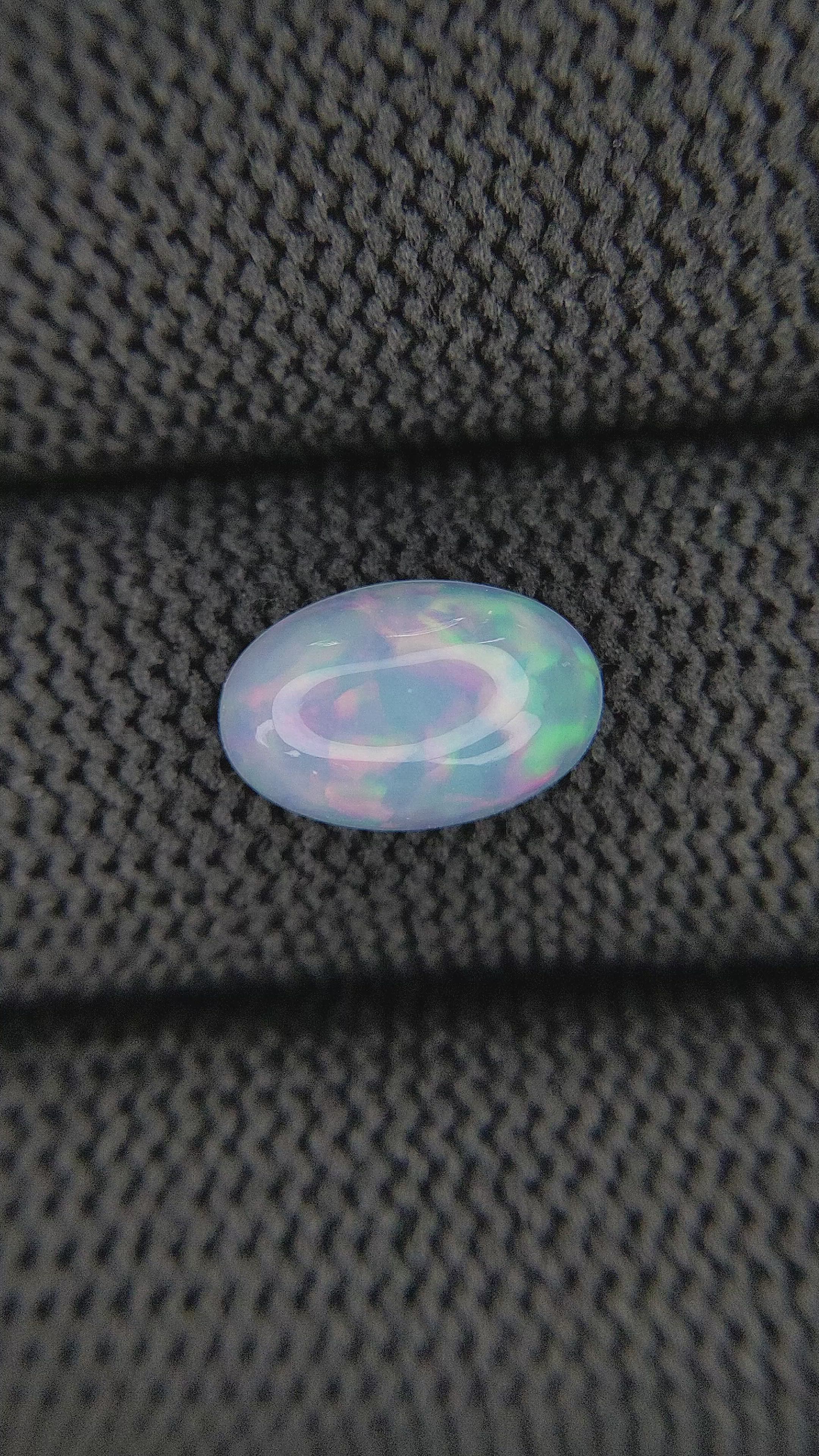 1.76 Ct. Multi Color Cabochon White Opal from Ethiopia Size Video