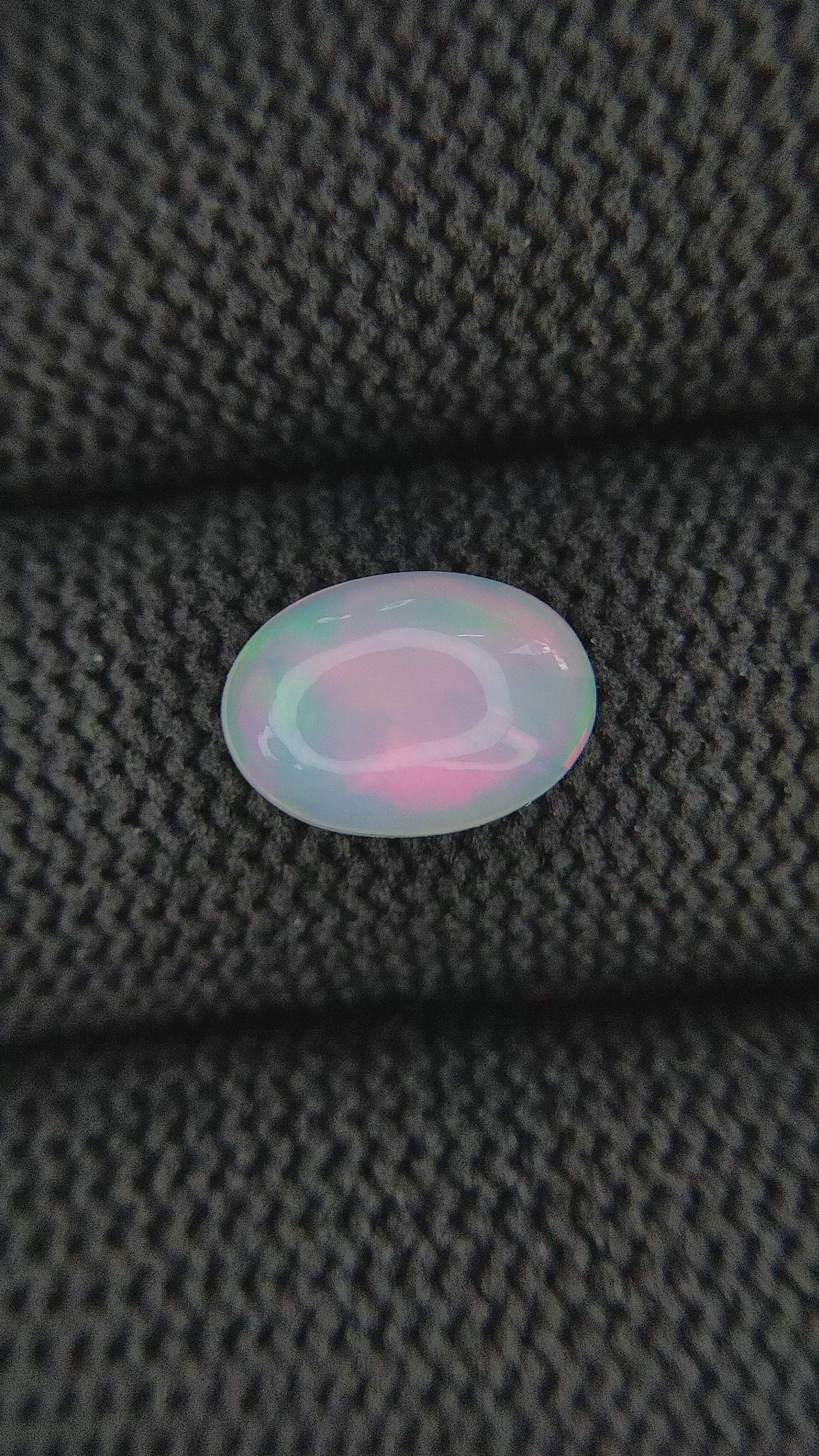 1.96 Ct. Multi Color Cabochon White Opal from Ethiopia Size Video