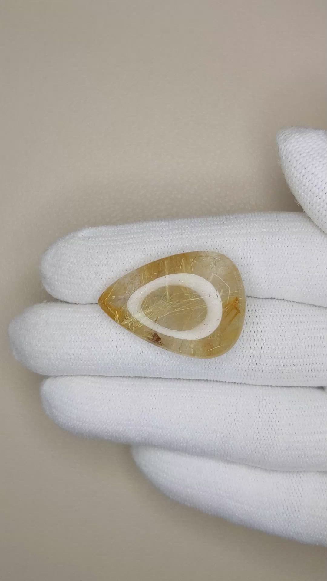 24.34 Ct. Cabochon Rutilated Quartz from Madagascar Size Video