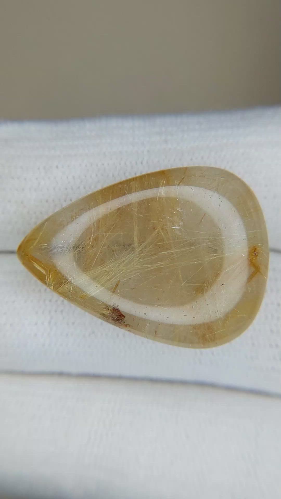24.34 Ct. Cabochon Rutilated Quartz from Madagascar Size Video