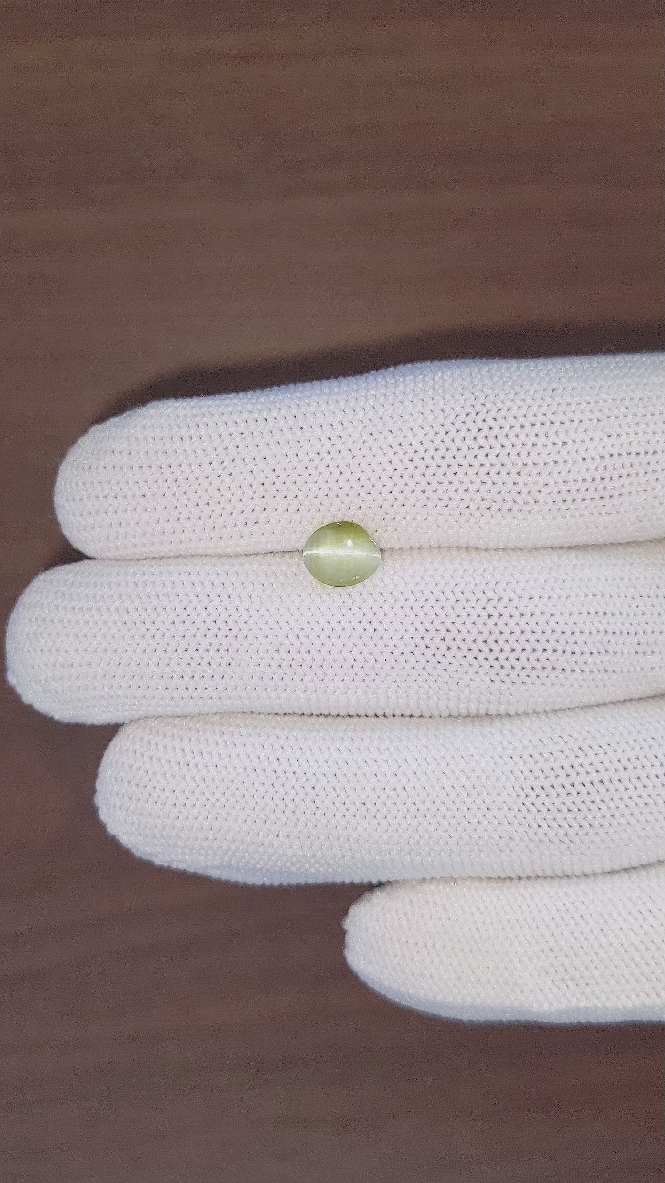 1.39 Ct. Yellowish Green Cabochon Chrysoberyl from Ceylon (Sri Lanka) Size Video