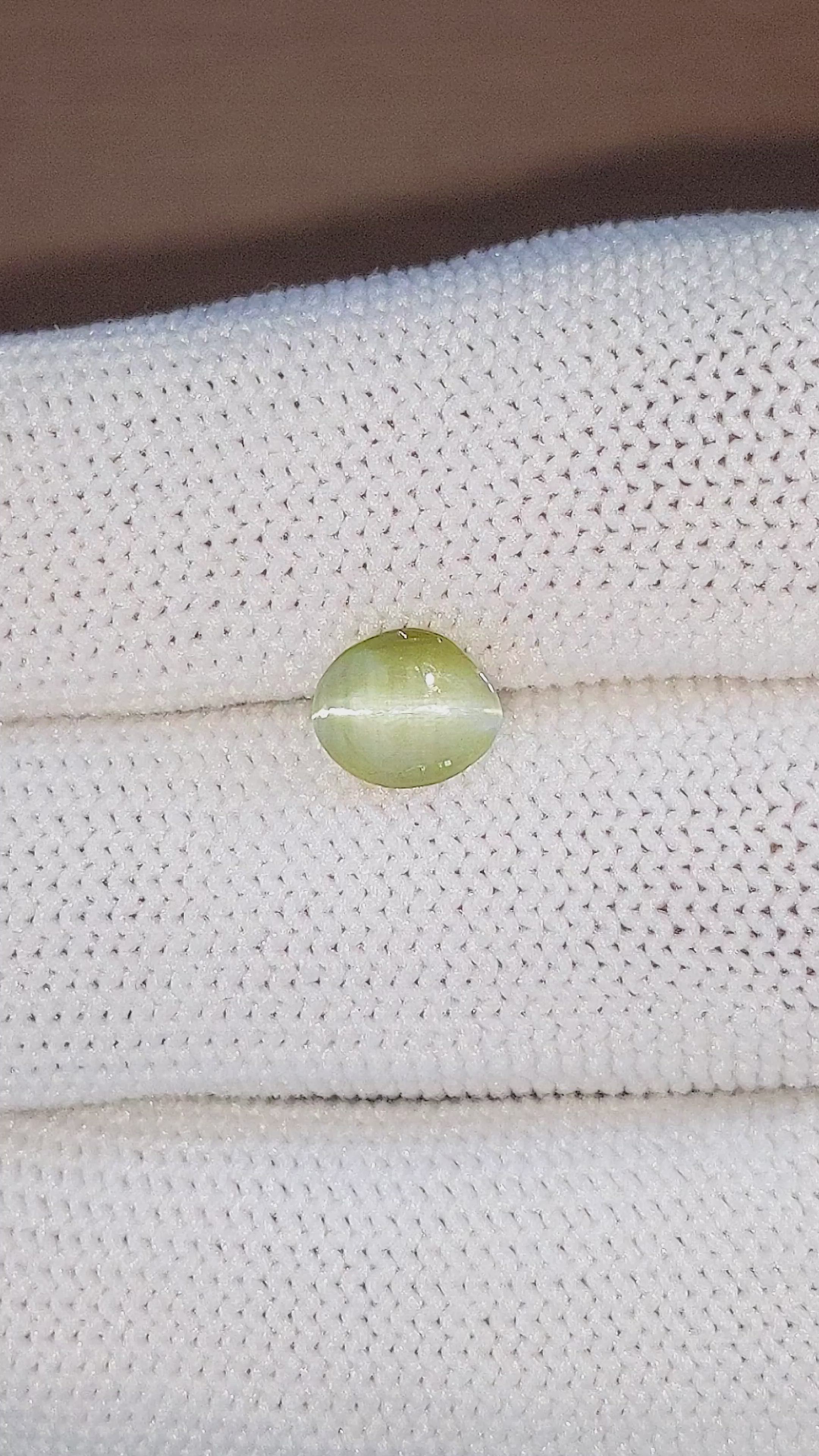 1.39 Ct. Yellowish Green Cabochon Chrysoberyl from Ceylon (Sri Lanka) Size Video